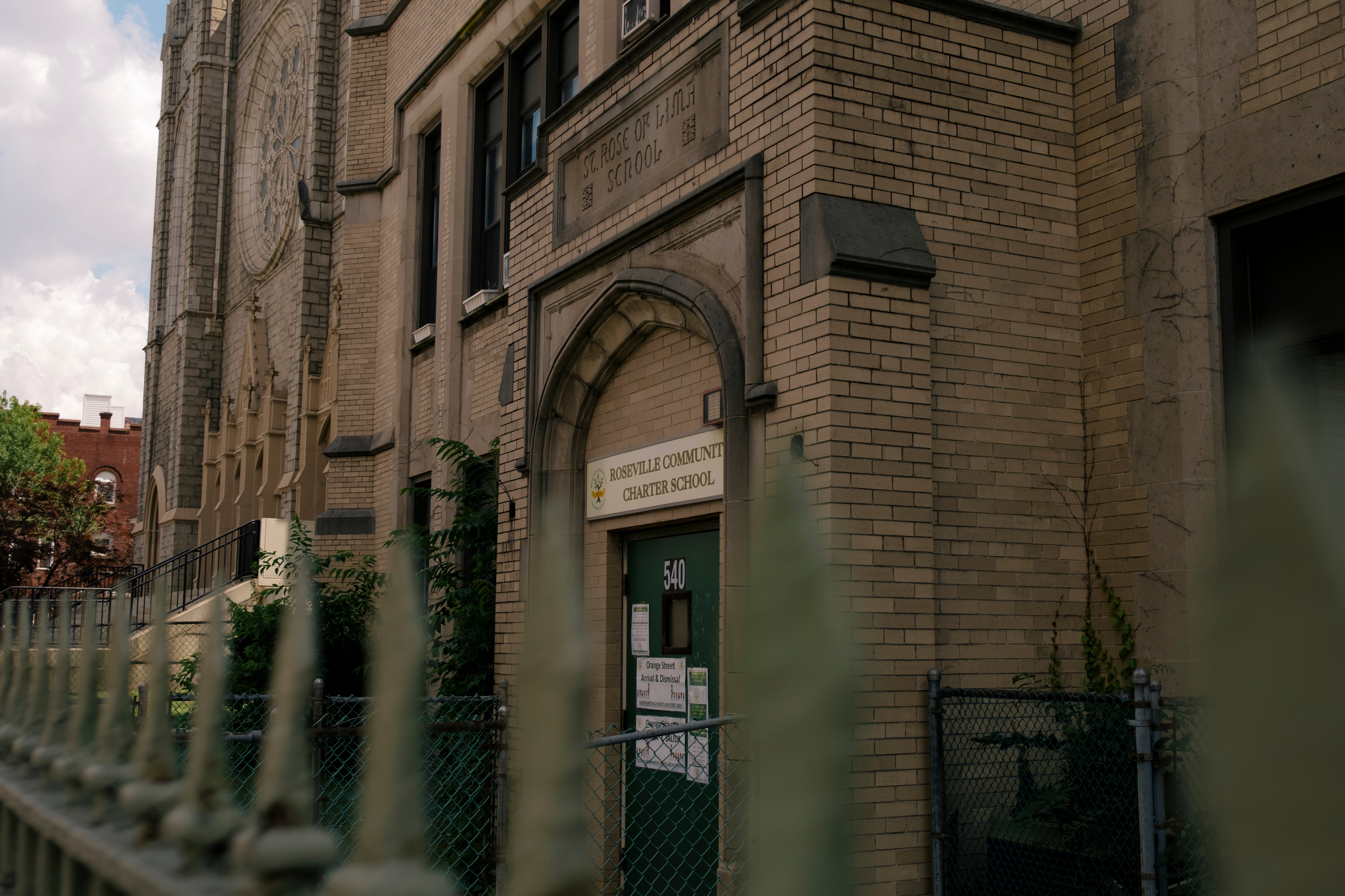 The front entrance to a school building outside.