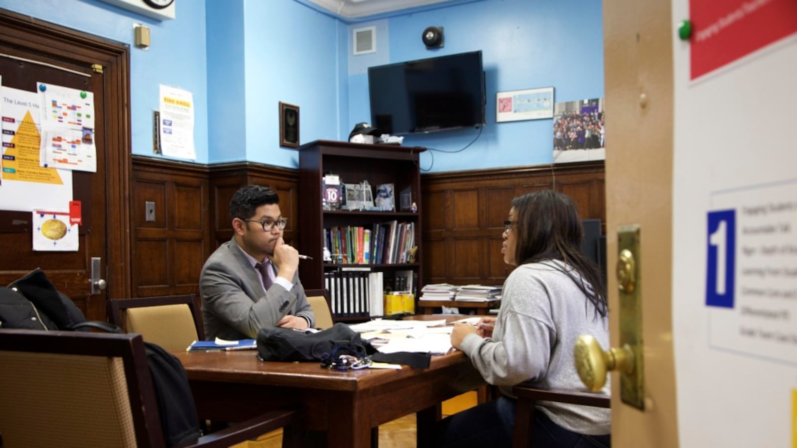 Principal Carl Manalo's small high school in Queens enrolled more than 100 new Central American immigrants.