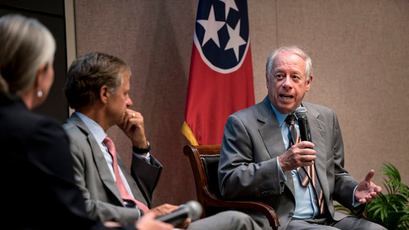 Former Tennessee Gov. Phil Bredesen speaks as his successor, Gov. Bill Haslam, listens during a 2017 forum.