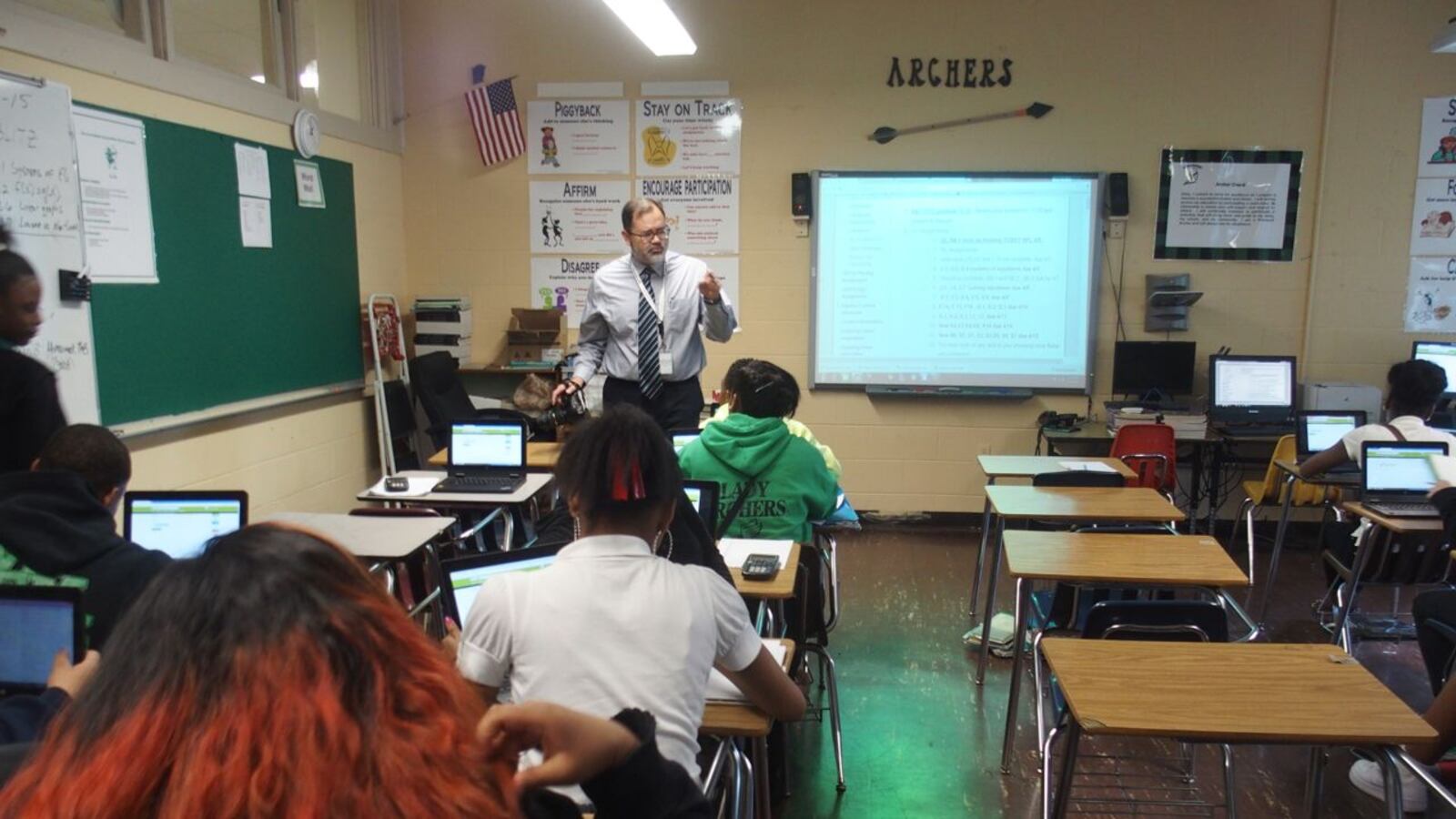 Students at Sherwood Middle School use laptop computers as part of a three-year pilot program in Shelby County Schools.