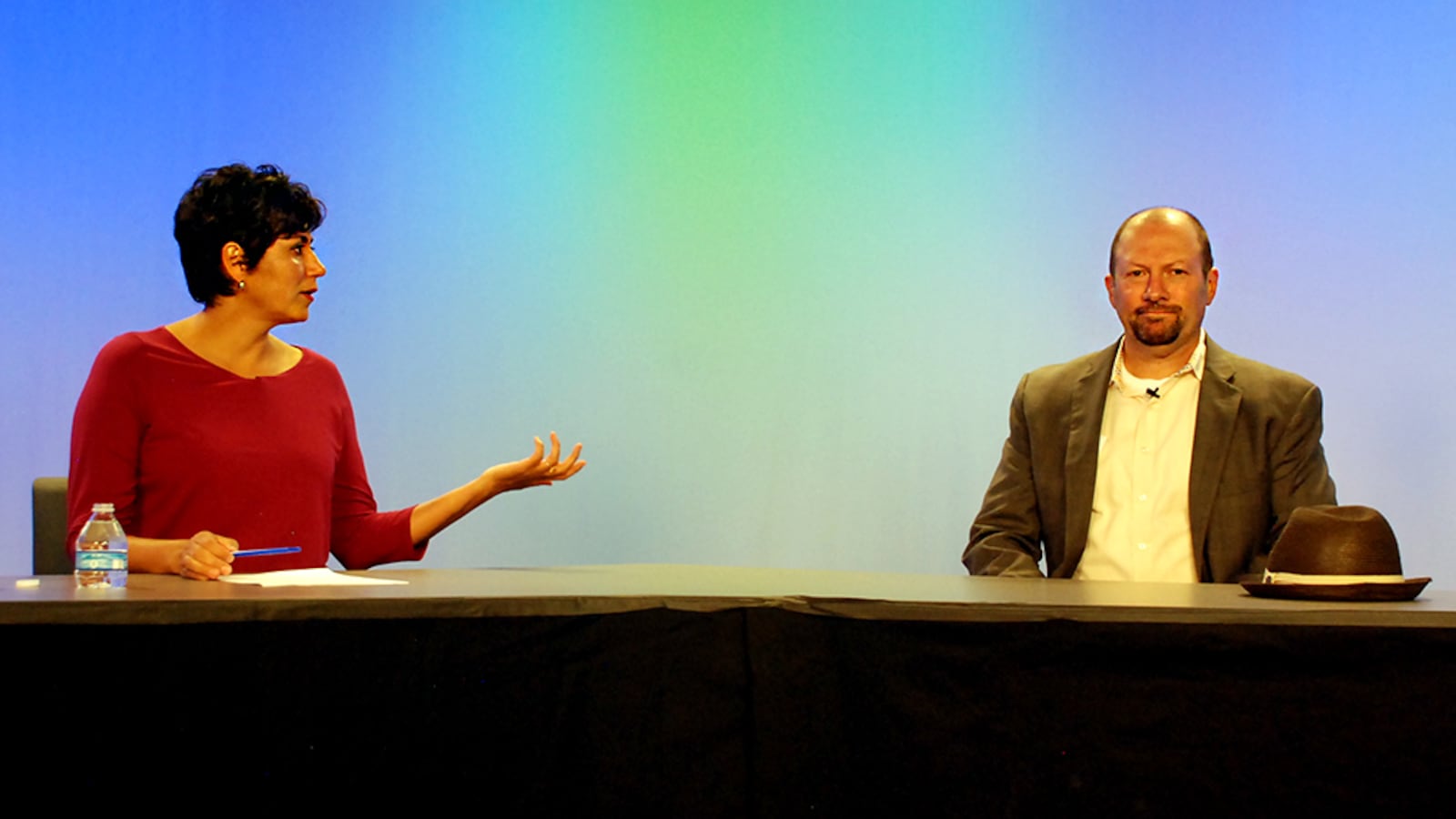Denver school board candidates Lisa Flores and Michael Kiley debated Monday night.