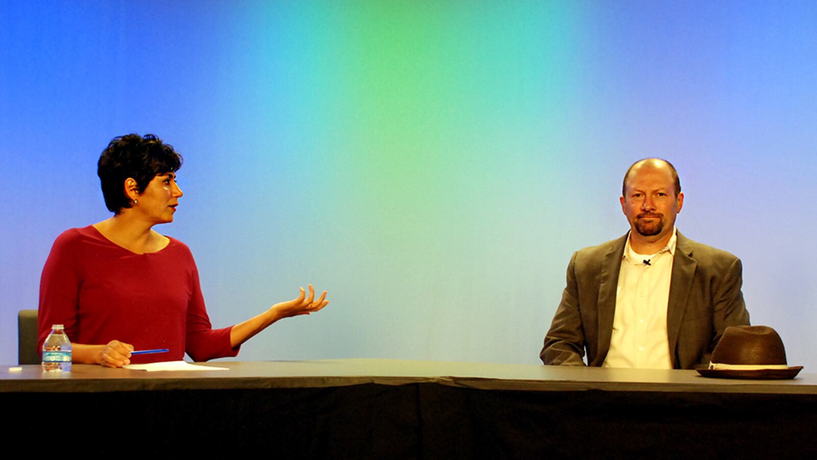 Denver school board candidates Lisa Flores and Michael Kiley debated Monday night.