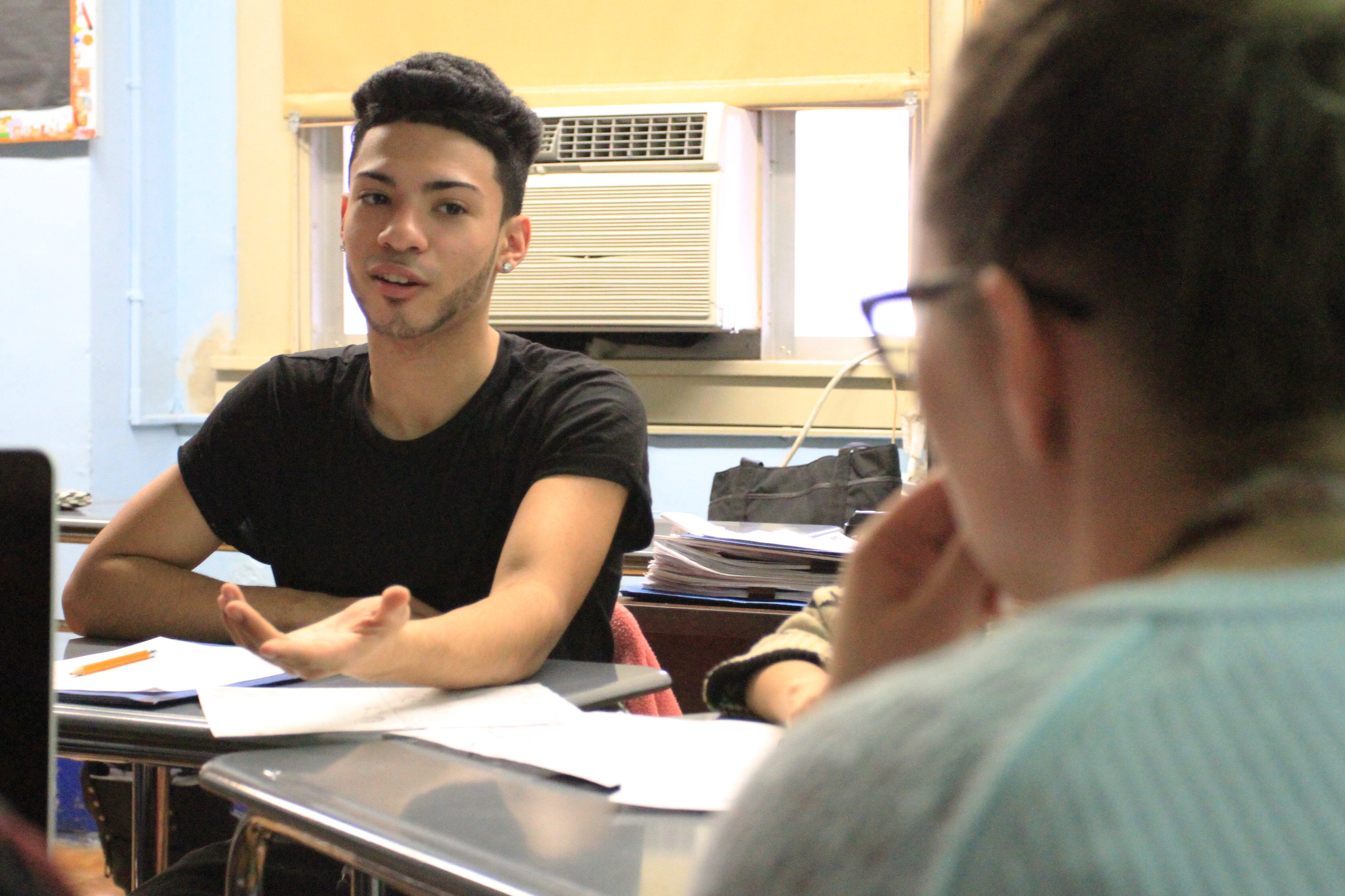 Fordham High School for the Arts junior William Carrasquillo, 16, talks about summer job and internship opportunities during his OneGoal class.