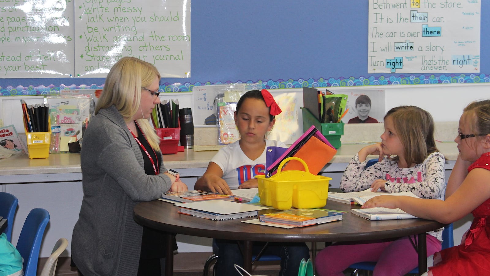 Chelsea Wendorf, who visited La Veta as part of the rural teacher immersion program, helps in a third grade classroom.