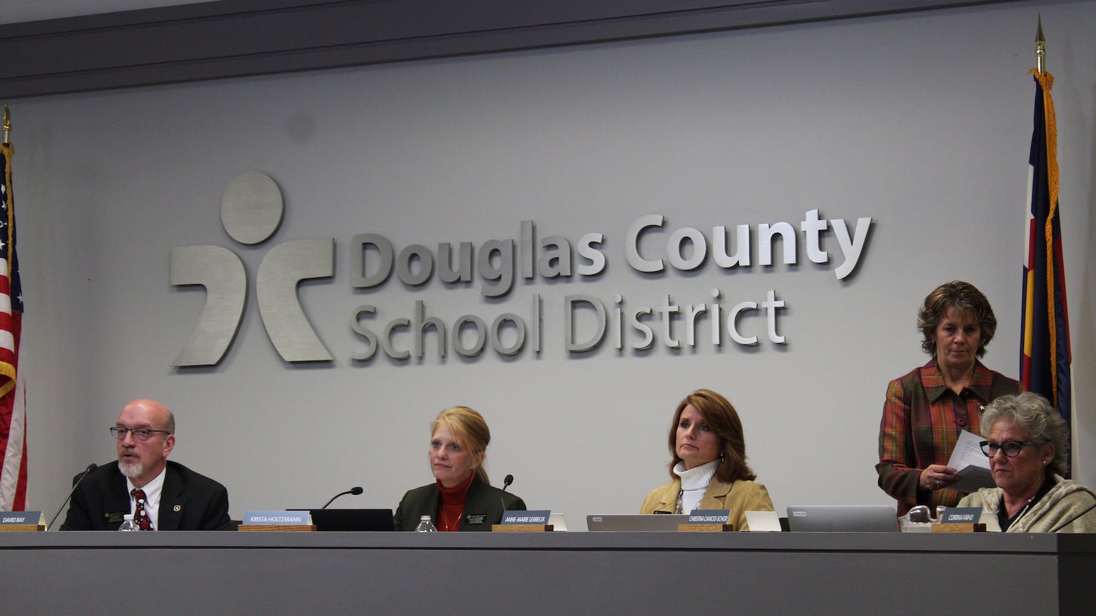 The Douglas County school board on Monday voted to end the district's voucher program and directed the district to seek an end to the protracted legal case. (Nic Garcia/Chalkbeat)