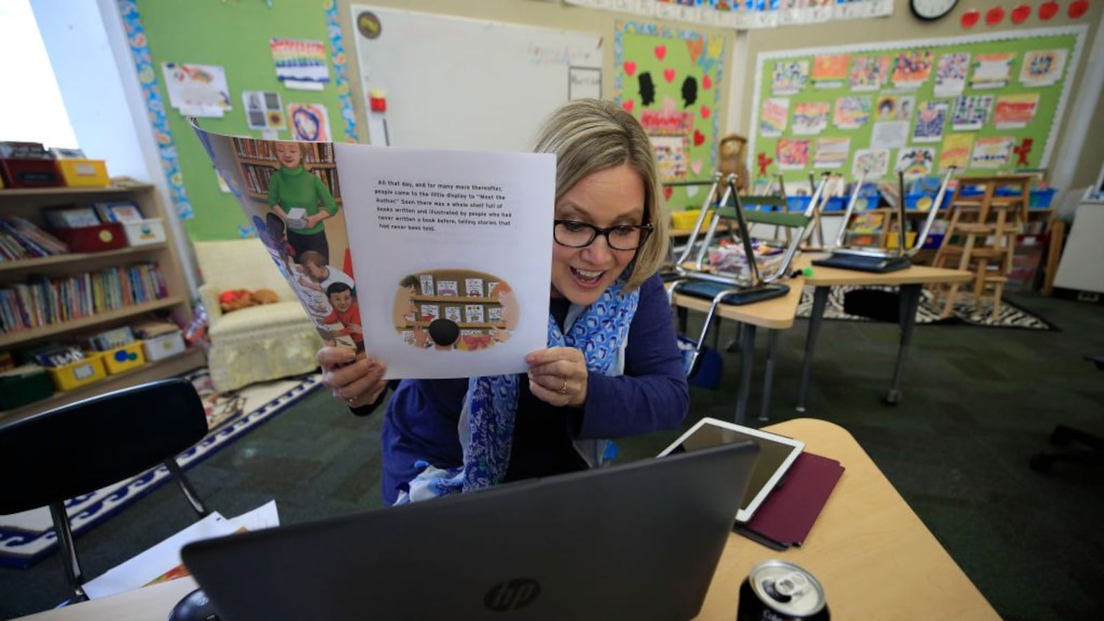 Joanne Collins Brock, a second grade teacher, teaches online in her empty classroom on April 15, 2020 in Goshen, Kentucky. (Photo by Andy Lyons/Getty Images)