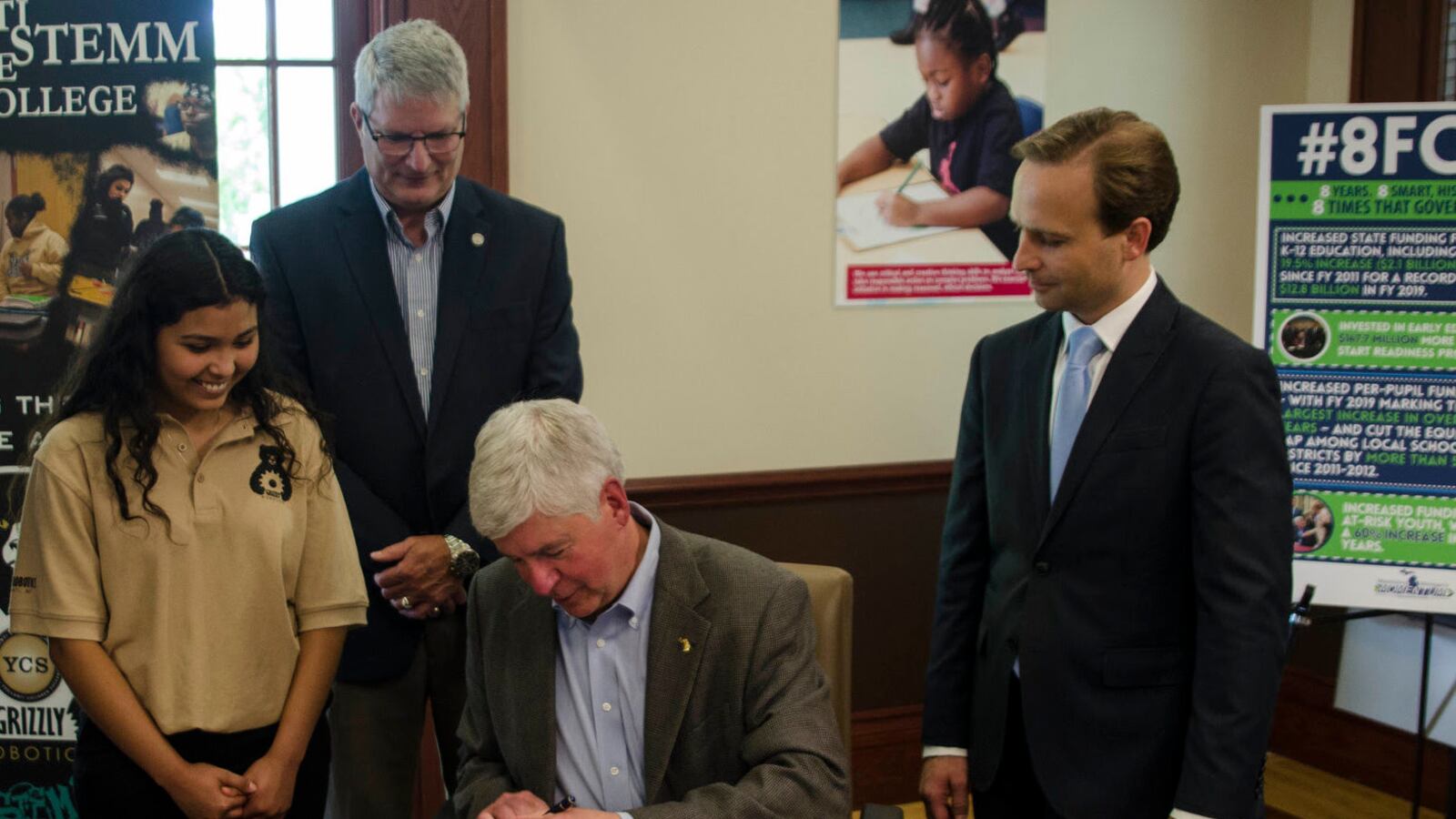 Gov. Rick Snyder signs his final education budget, which once again raises the threat of closure for the state's lowest performing schools.
