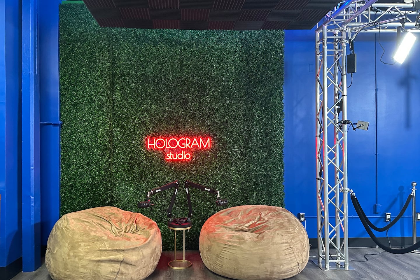 Beanbag chairs offer a chance for students to relax at microphones in the podcast section of a new studio focusing on student mental health at Ralph R. McKee Career and Technical Education High School in Staten Island. (Trenton Daniel / Healthbeat)