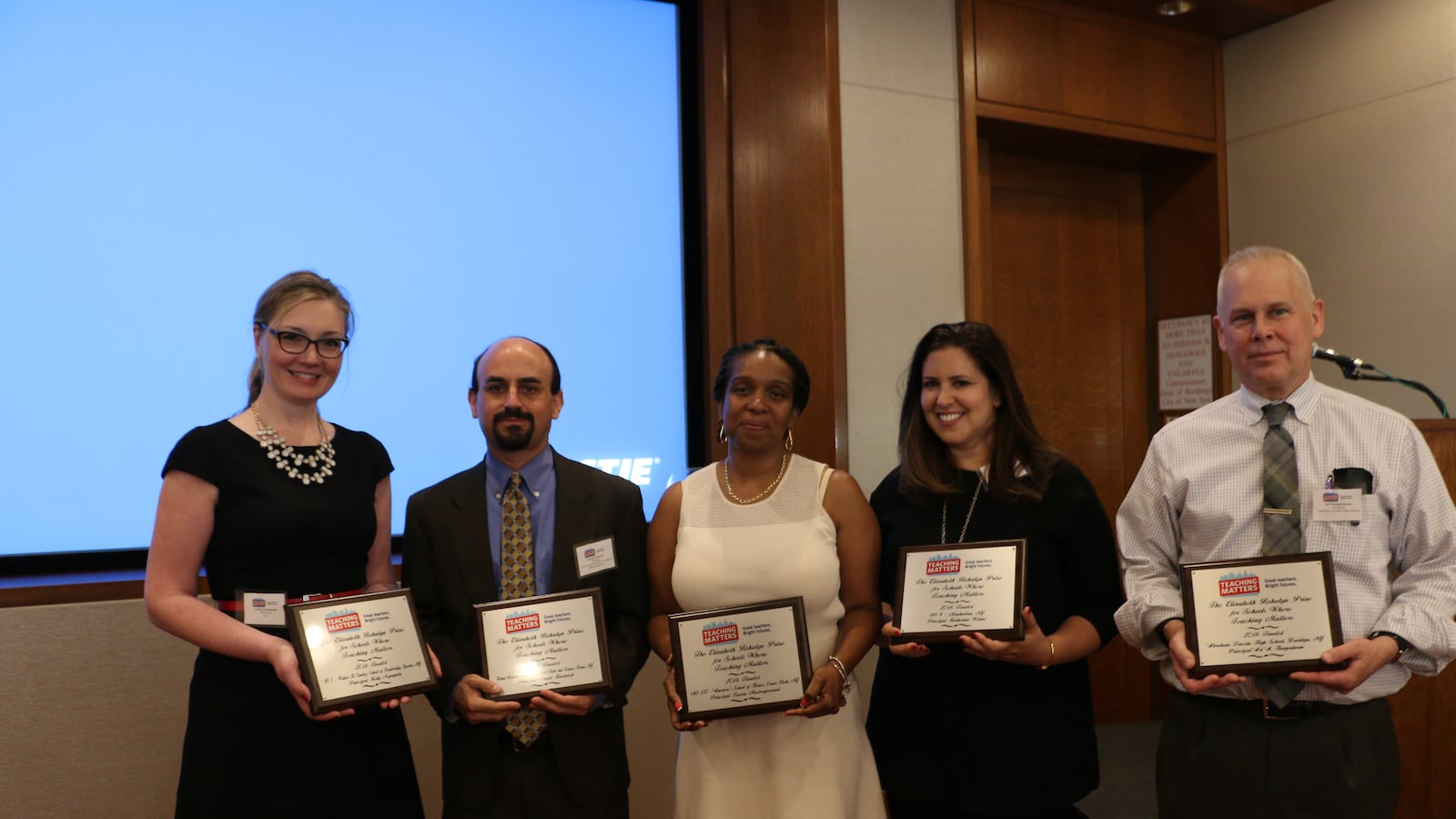 Joanna Freedman (second from right), pictured here with four other semi-finalists, accepted the grand prize Teaching Matters award