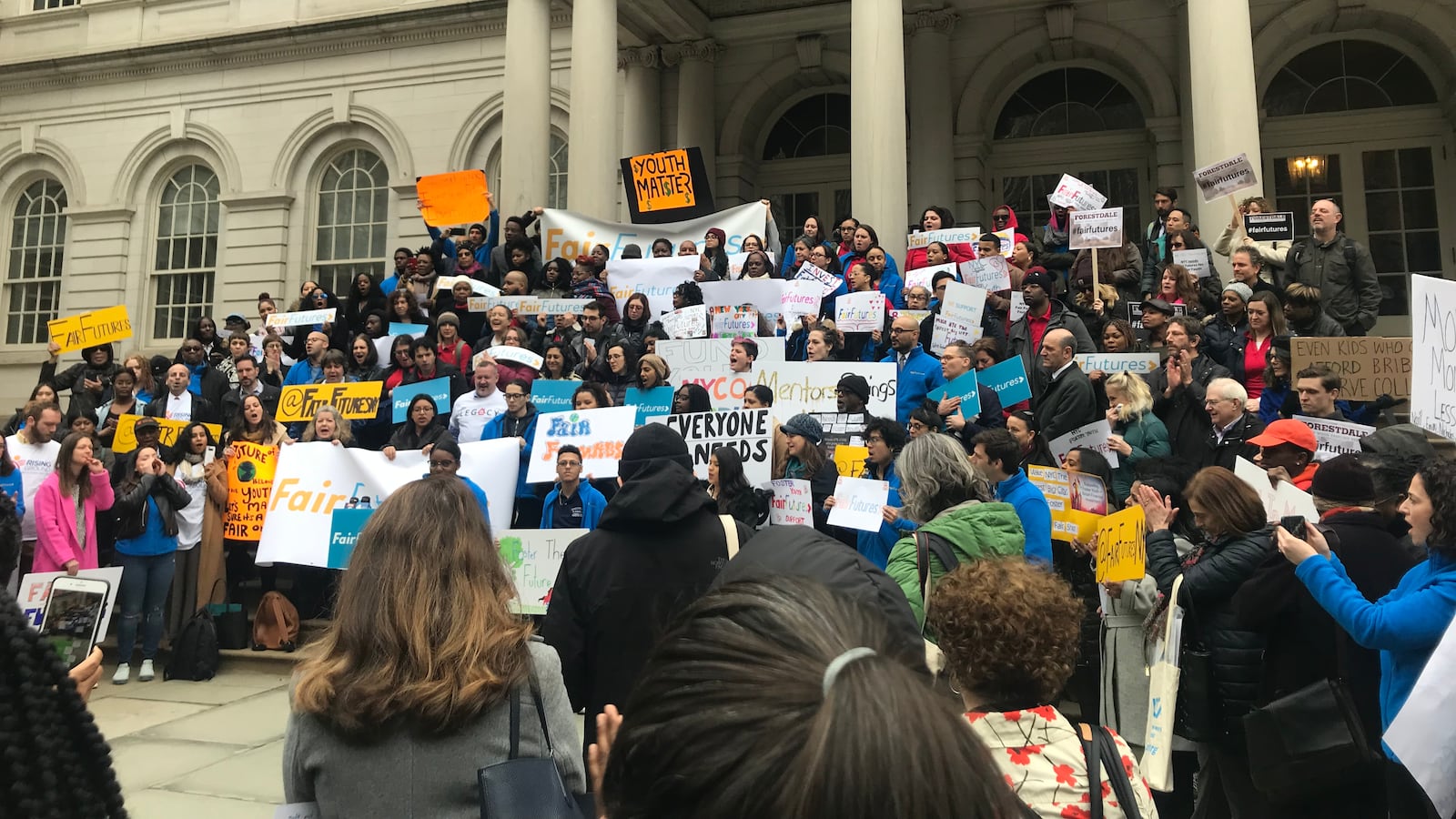 A rally was held at City Hall to demand for a comprehensive coaching program for foster youth and adults who age out of the system.