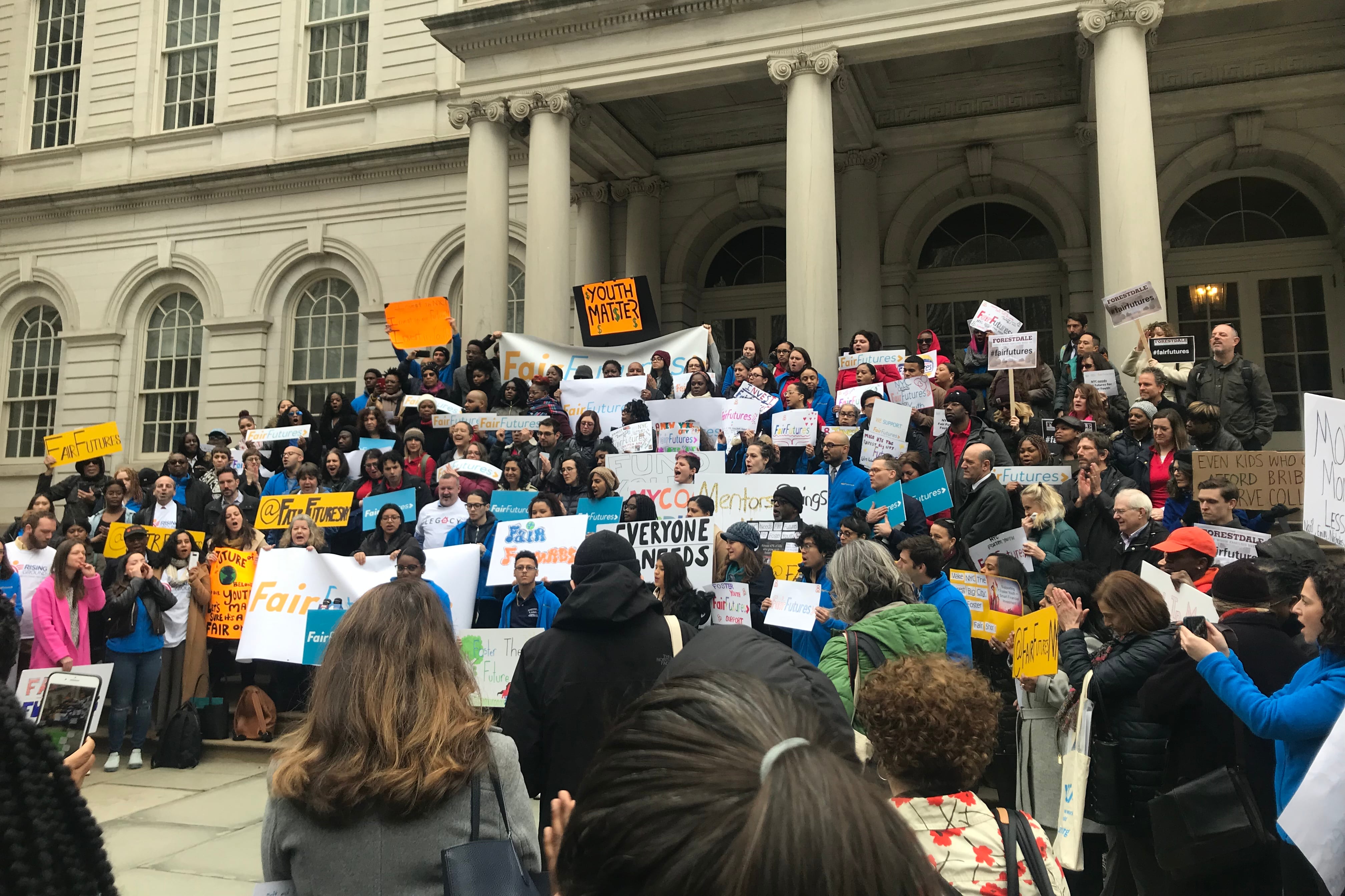 A rally was held at City Hall to demand for a comprehensive coaching program for foster youth and adults who age out of the system.