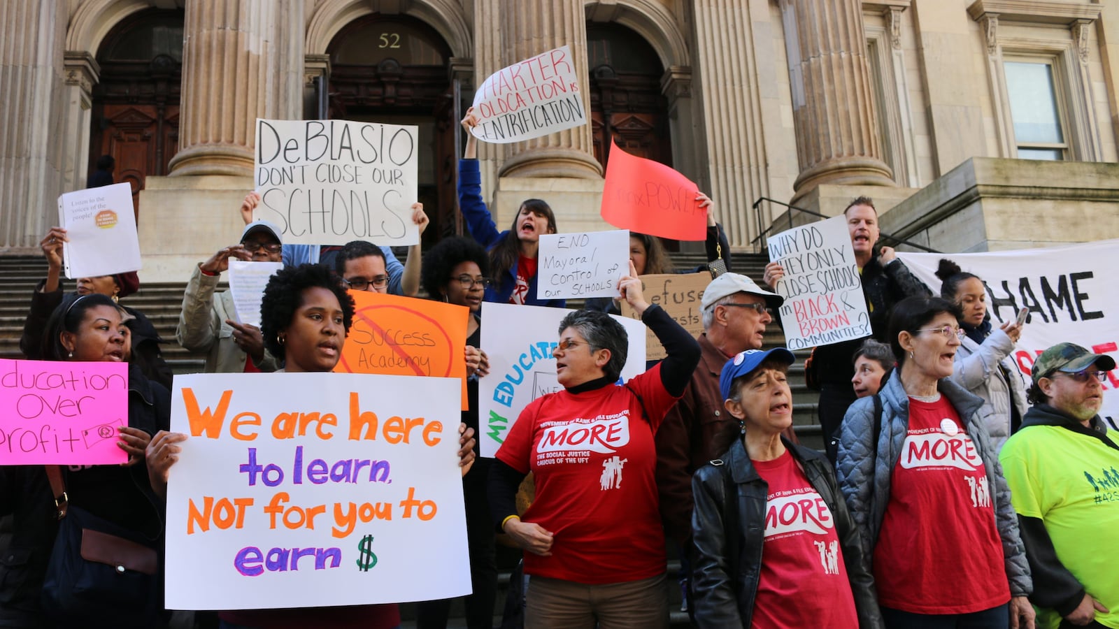 Parents and advocates gathered at the education department's lower Manhattan headquarters in February to protest proposed school closures.