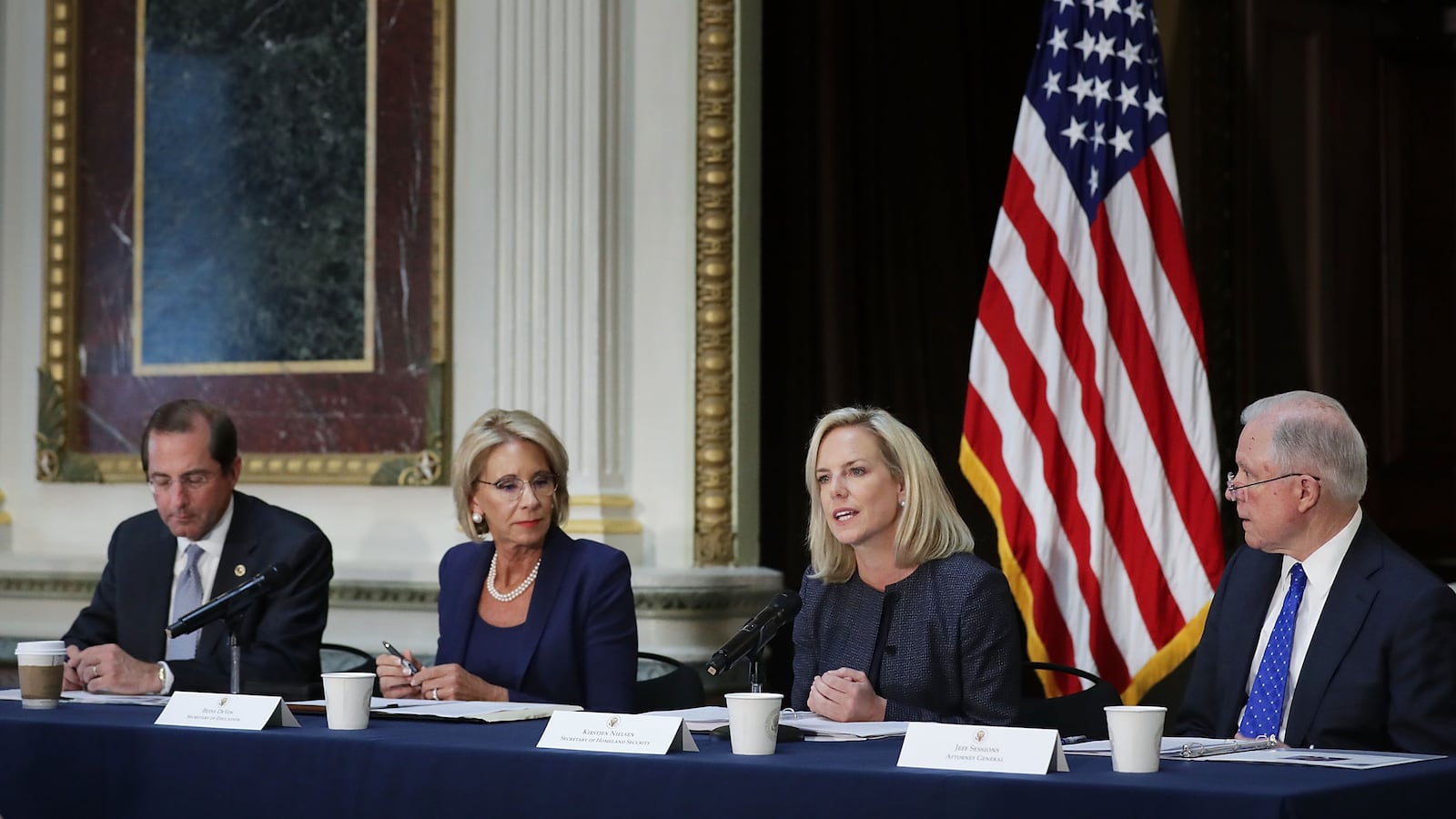 U.S. Health and Human Services Secretary Alex Azar, Education Secretary Betsy DeVos, Homeland Security Secretary Kirstjen Nielsen and Attorney General Jeff Sessions participate in a meeting of the Federal Commission on School Safety on August 16, 2018.   (Photo by Chip Somodevilla/Getty Images)
