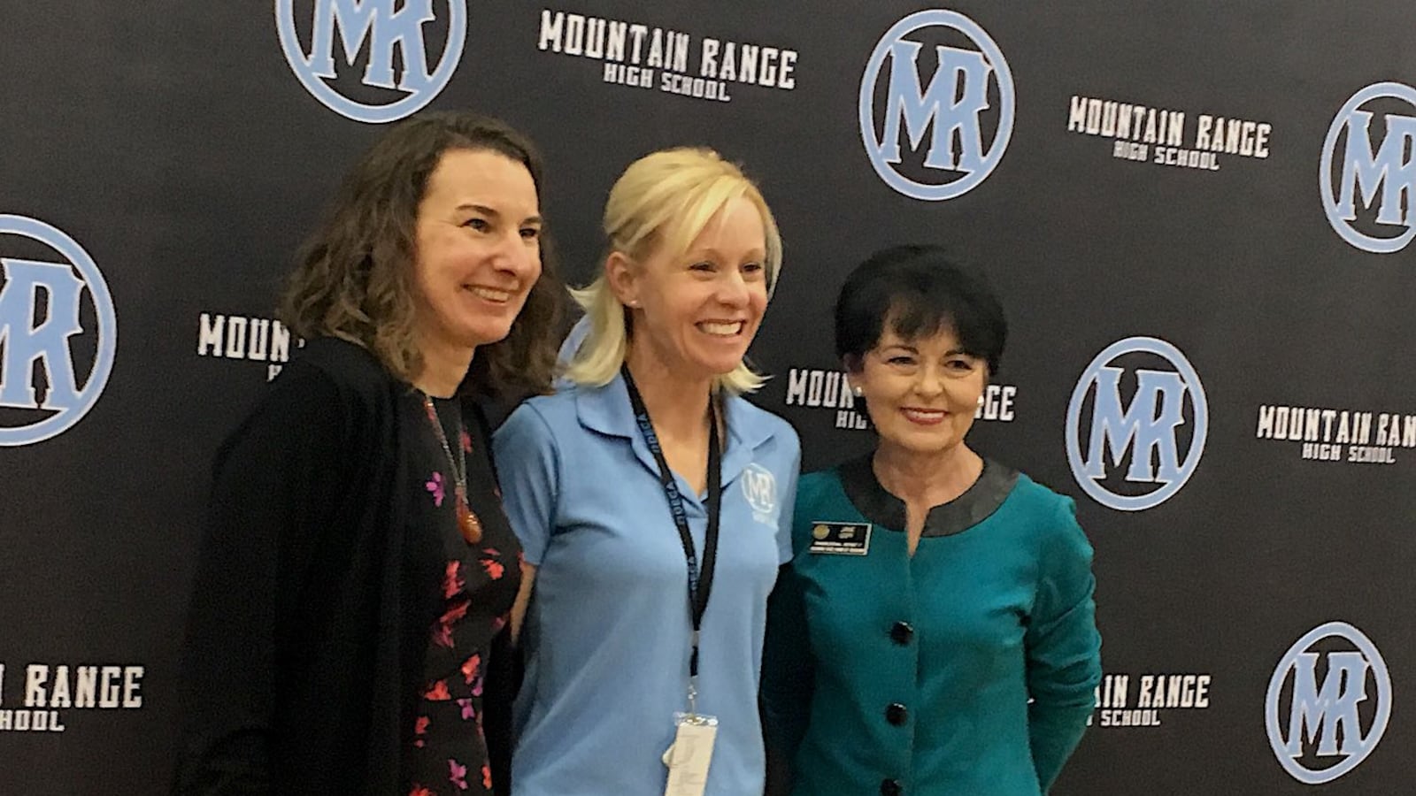 Hilary Wimmer, Colorado's 2020 Teacher of the Year, stands between State Education Commissioner Katy Anthes, left, and Jane Goff, a member of the state board of education.
