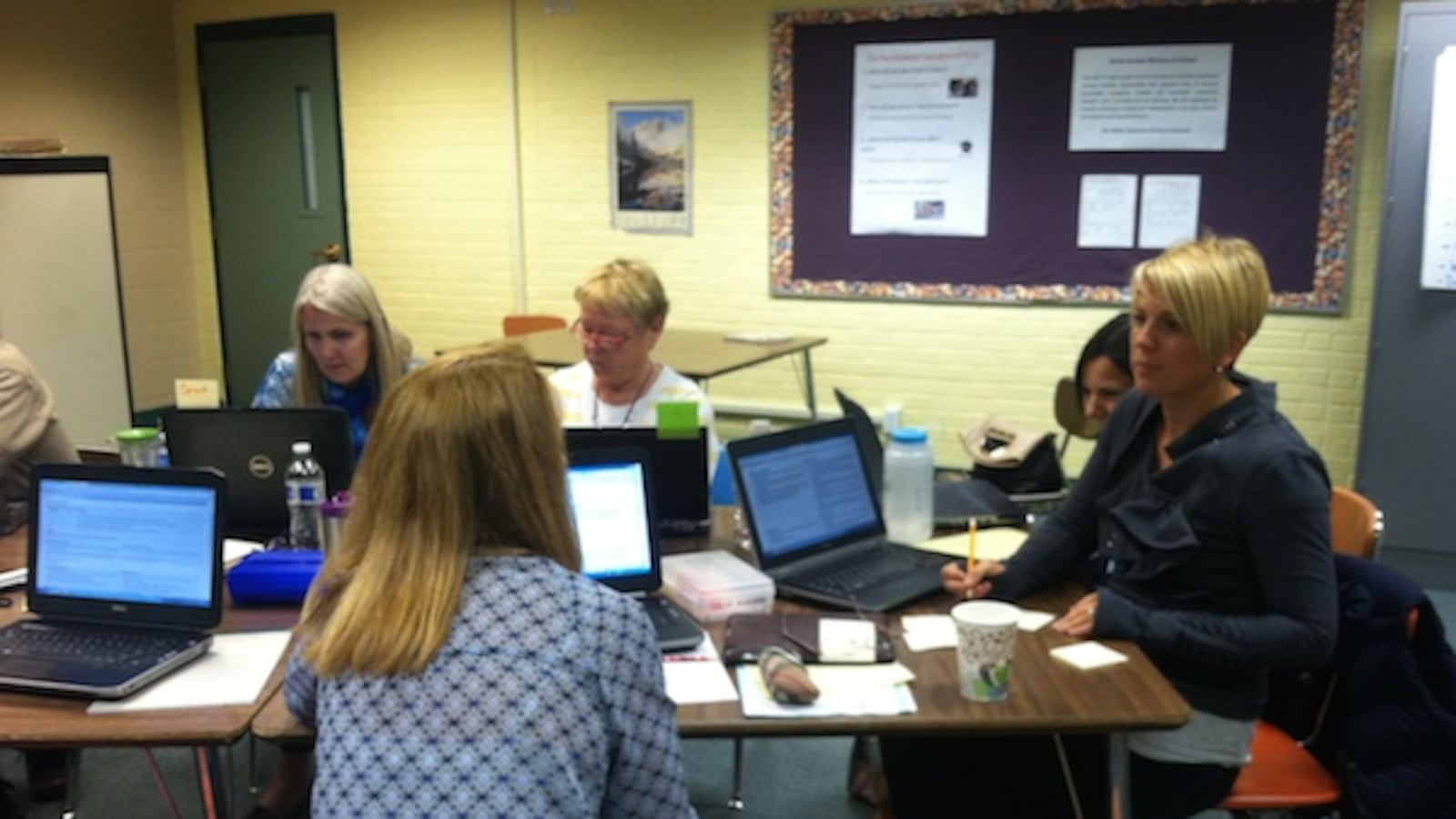 The language arts team works through planning next year's curriculum.