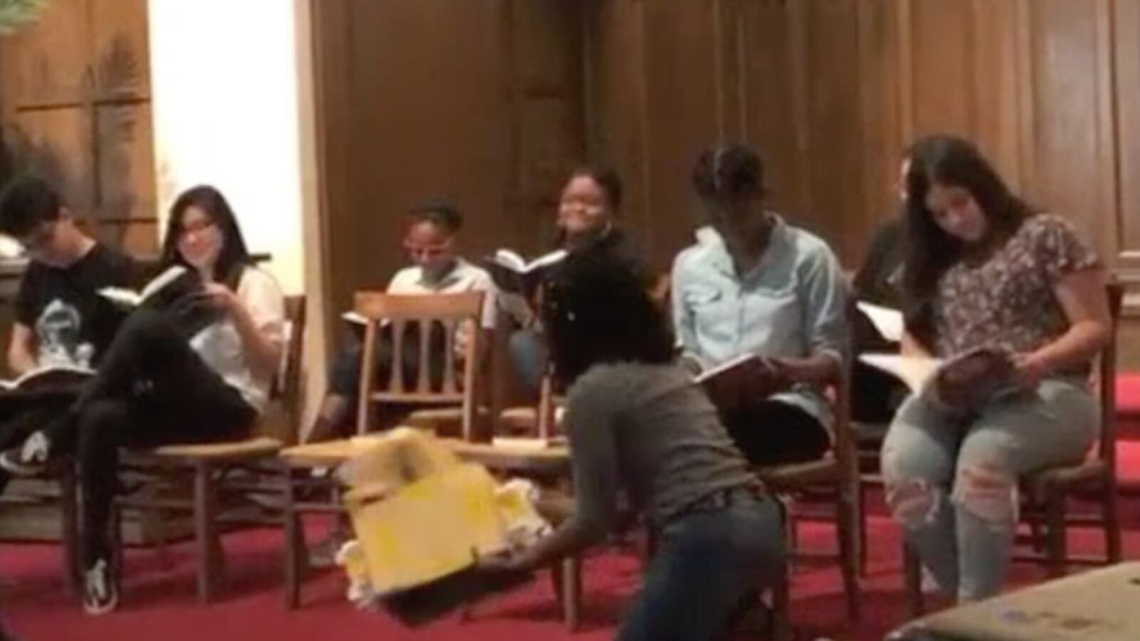 Students in the 482Forward youth organizing collective perform a play about recent events in Detroit schools.