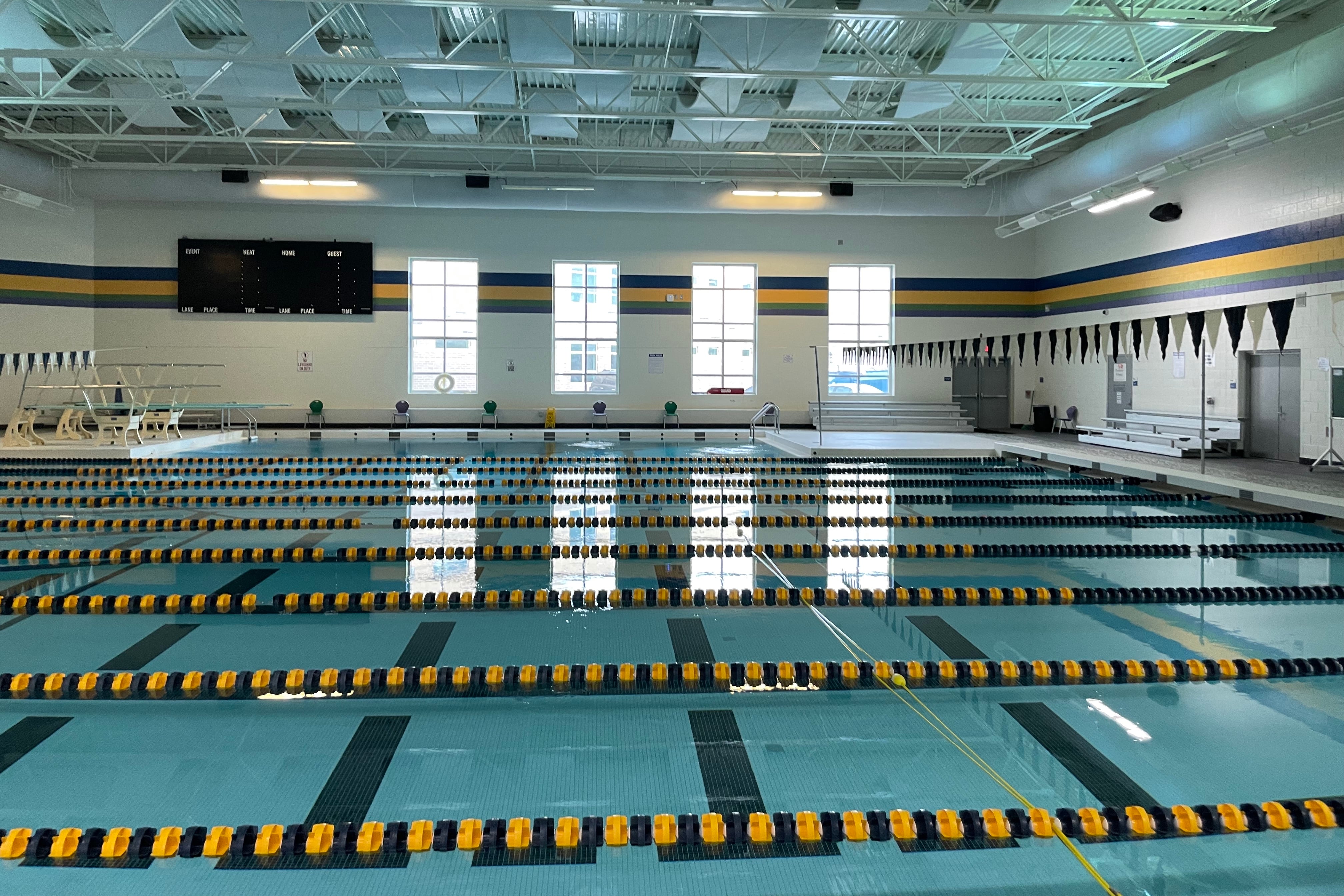 A pool inside of a high school.