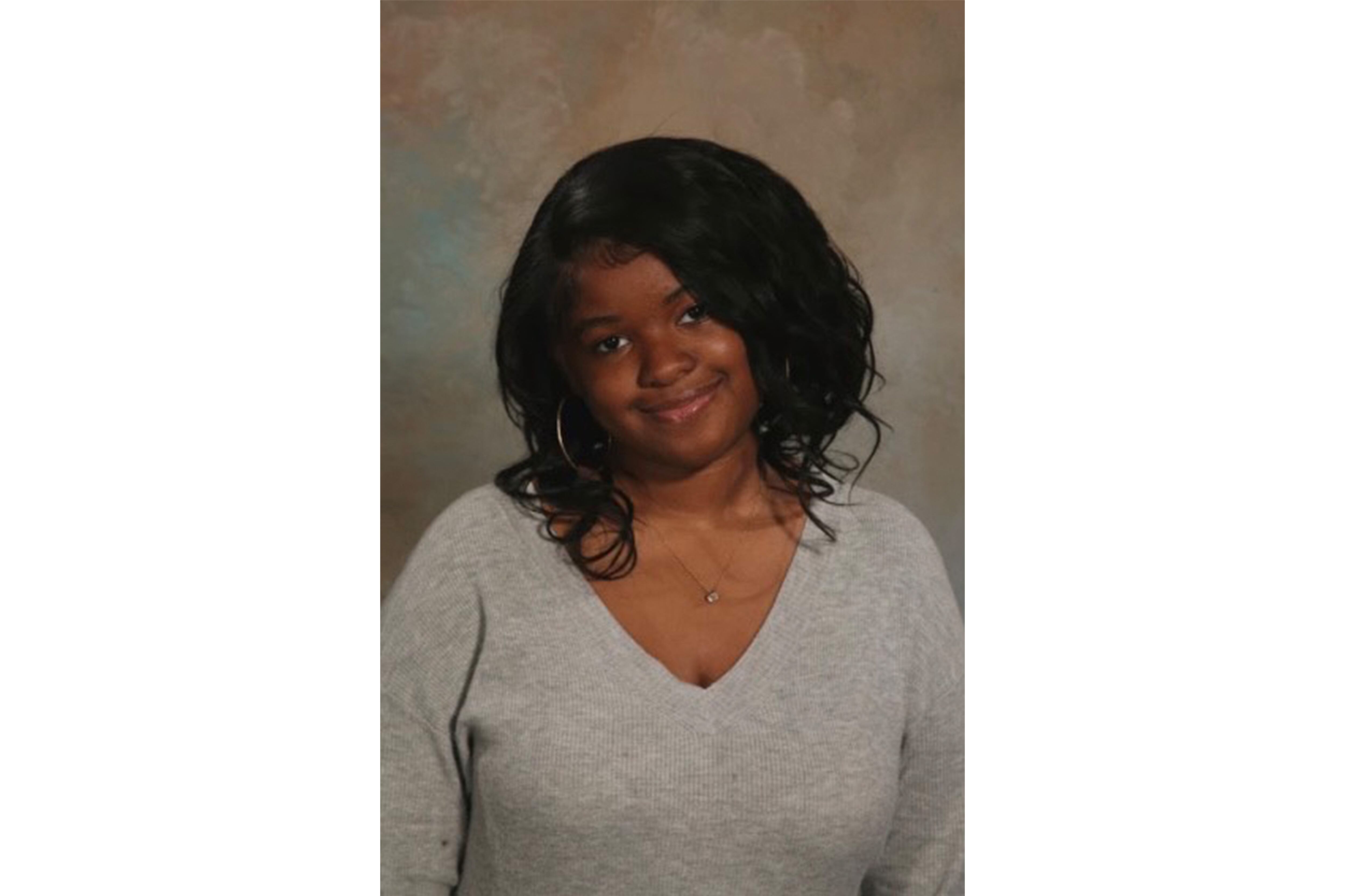 A portrait of a teenage girl