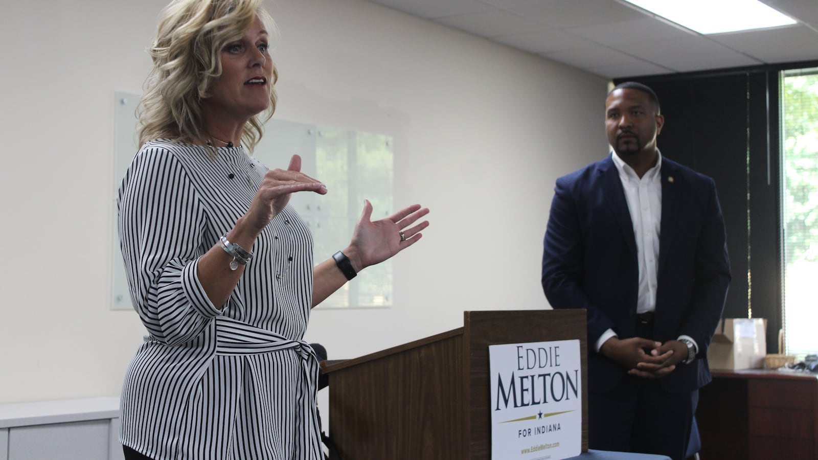 State Superintendent Jennifer McCormick speaks alongside State Senator Eddie Melton in July at their community conversation in Indianapolis.