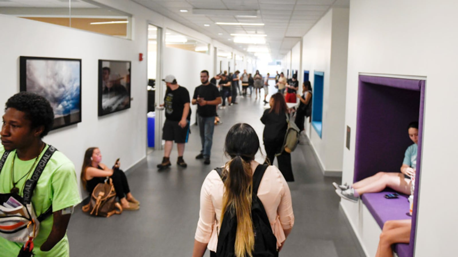Sharai Conde walks down a hallway for her introduction to eastern religions class at Metropolitan State University of Denver in August 2019. Conde is an 18-year-old first-generation college student, who is the daughter of Mexican immigrants.