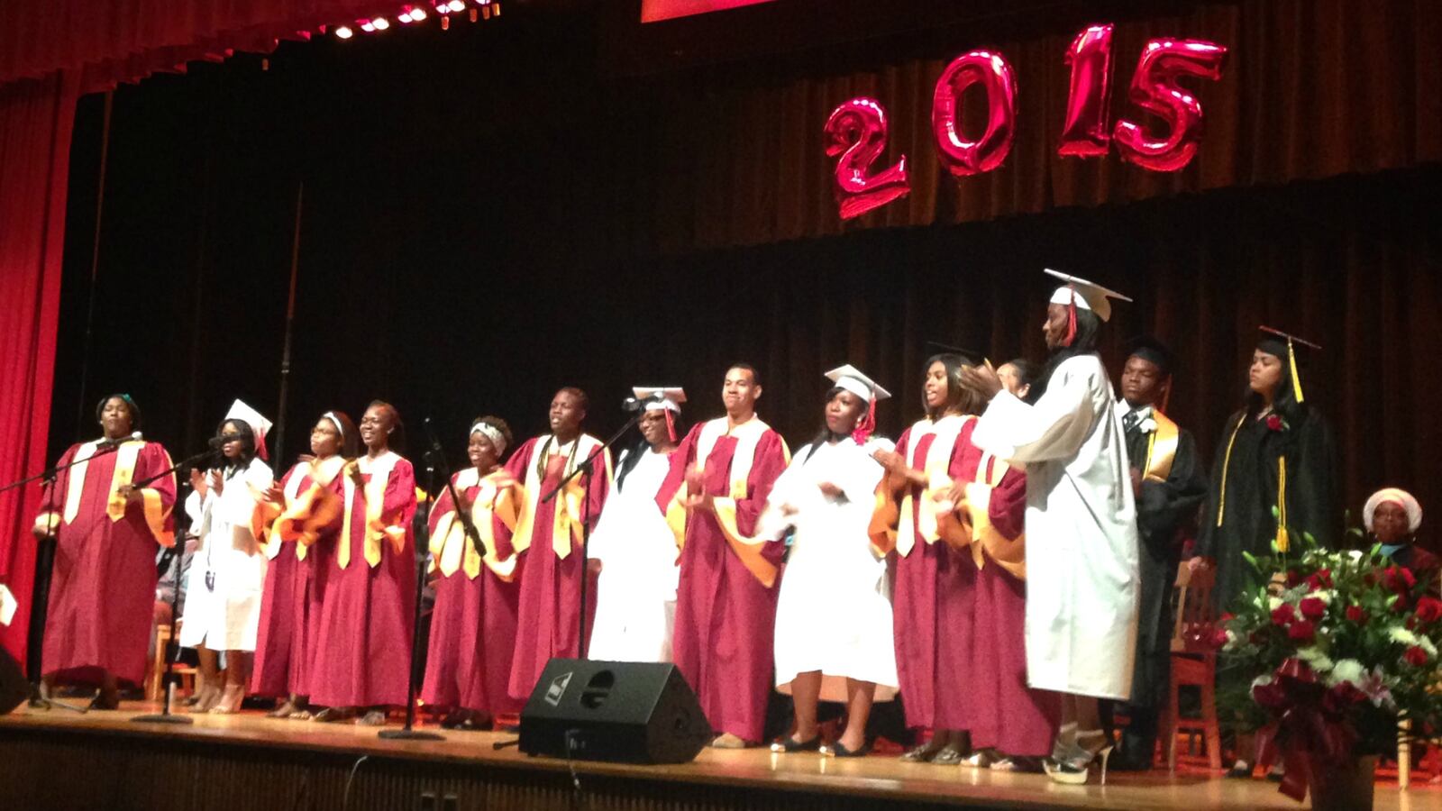 A joint Medgar Evers-Boys and Girls choir performed at a graduation.