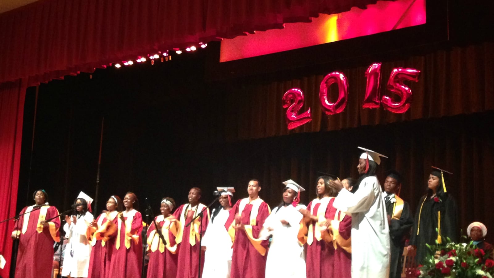 A joint Medgar Evers-Boys and Girls choir performed at a graduation.