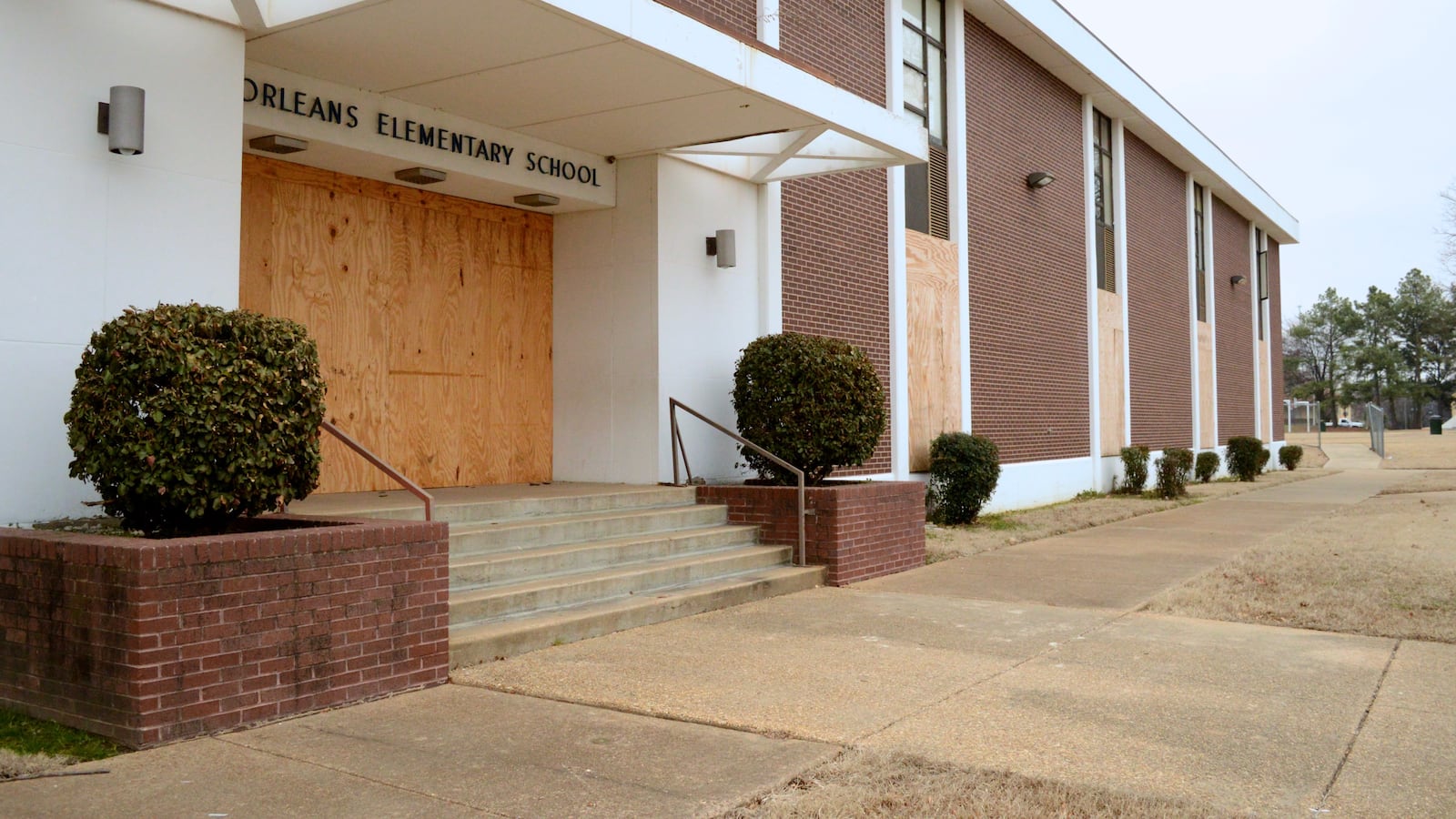 A boarded-up Orleans Elementary School is among Memphis schools closed since 2012.