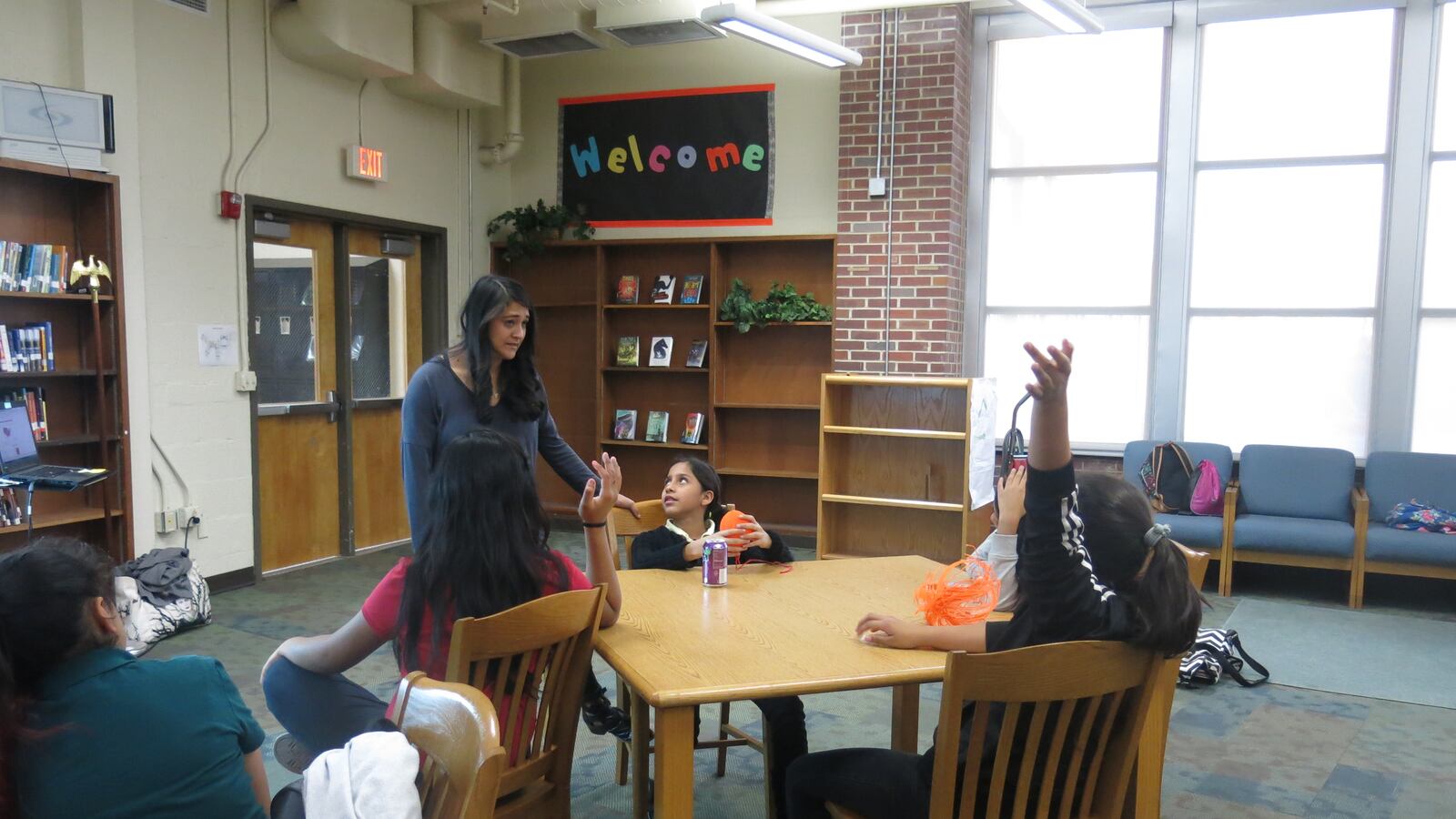 Patty Madera talks with students at an after school program at Nashville's Madison Middle the day after the presidential election.