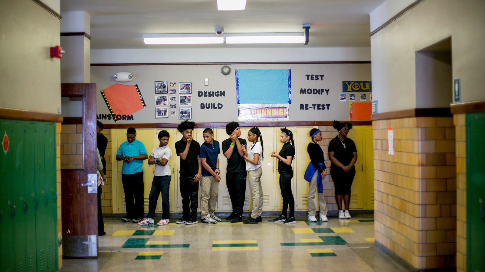 The students of Bethune Elementary-Middle School’s homeroom 8B line up to go to lunch. Collectively, 31 students in the class attended 128 schools by the time they reached eighth grade.