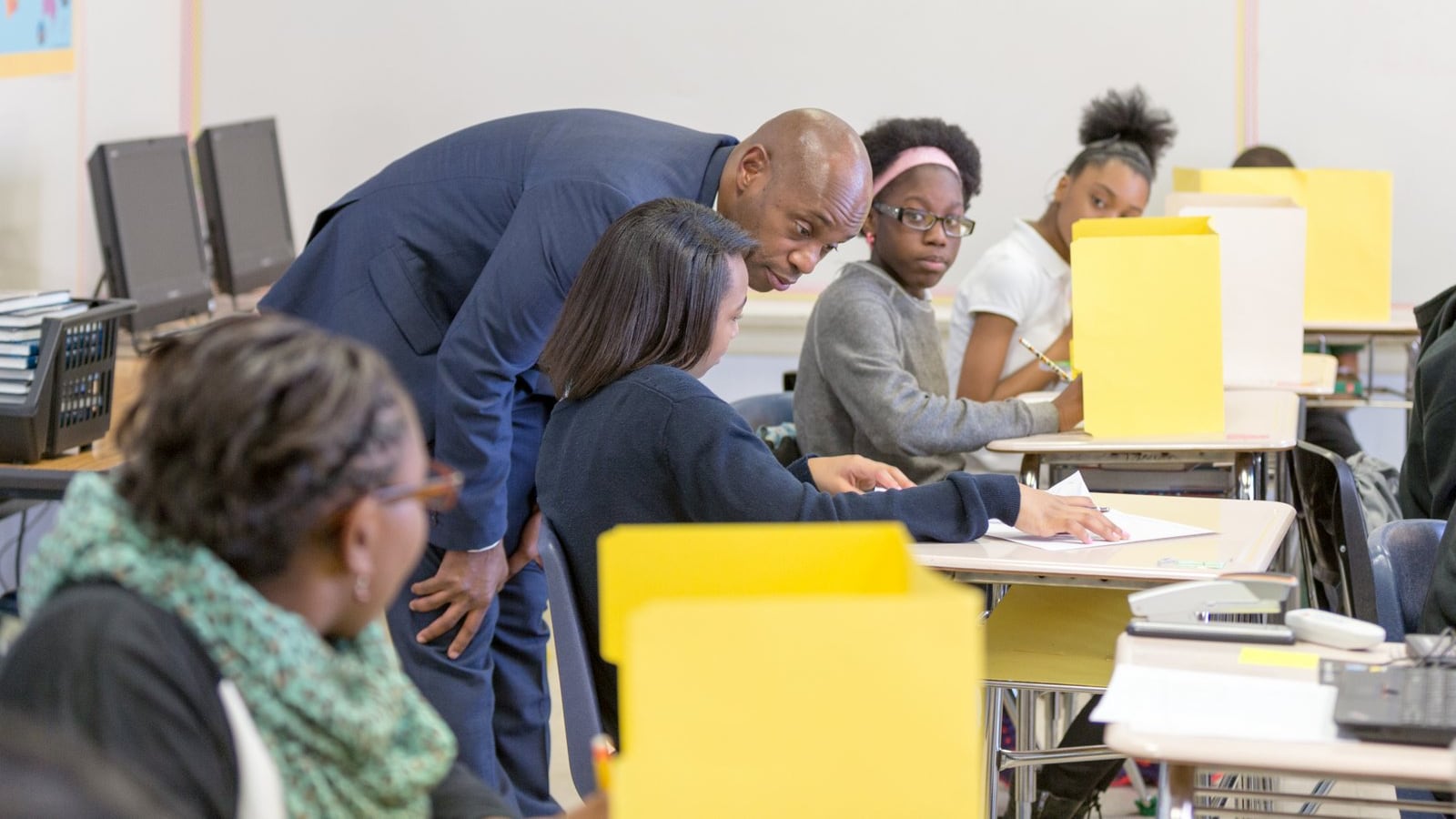 Superintendent Dorsey Hopson visits classrooms and students at Snowden School in Memphis. Hopson has proposed $50 million in cuts to staffing and programs for Shelby County Schools and describes the school system's financial situation as "dire."