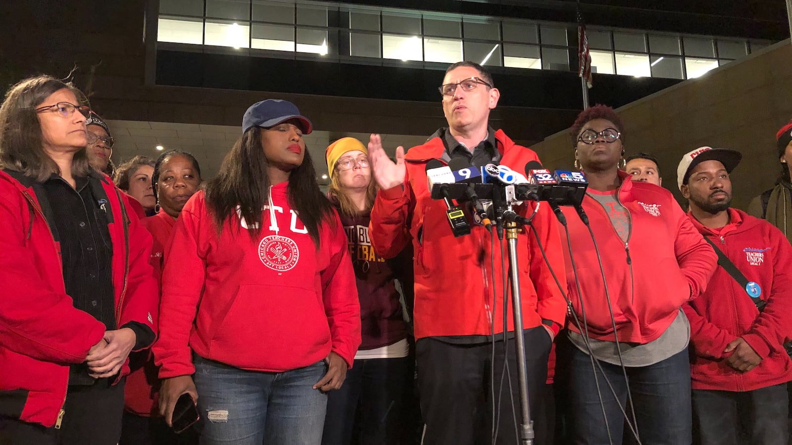 Chicago Teachers Union chief Jesse Sharkey, center, said Oct. 21, 2019, that hopes have receded for a quick settlement to the strike.