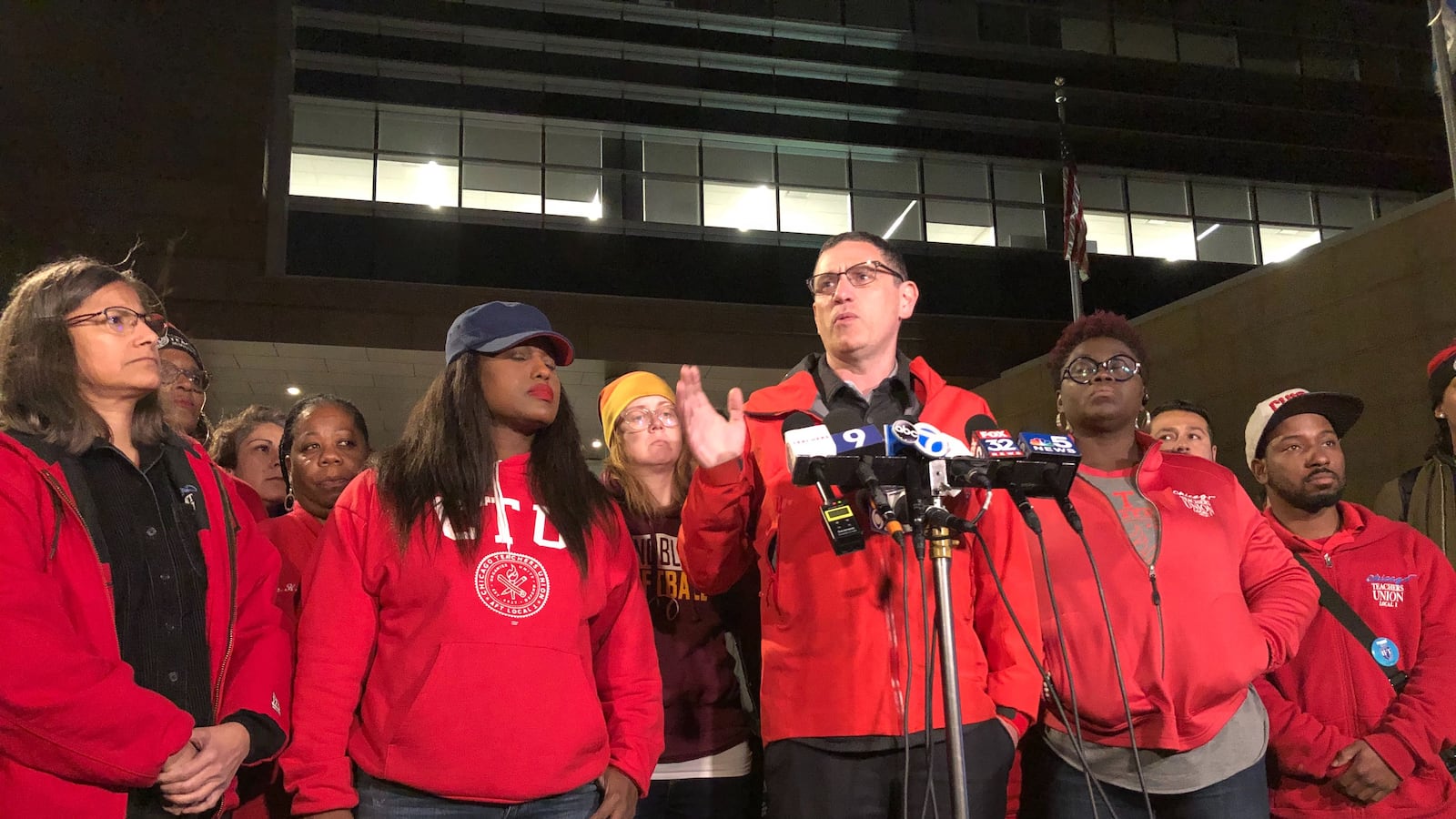 Chicago Teachers Union chief Jesse Sharkey, center, said Oct. 21, 2019, that hopes have receded for a quick settlement to the strike.