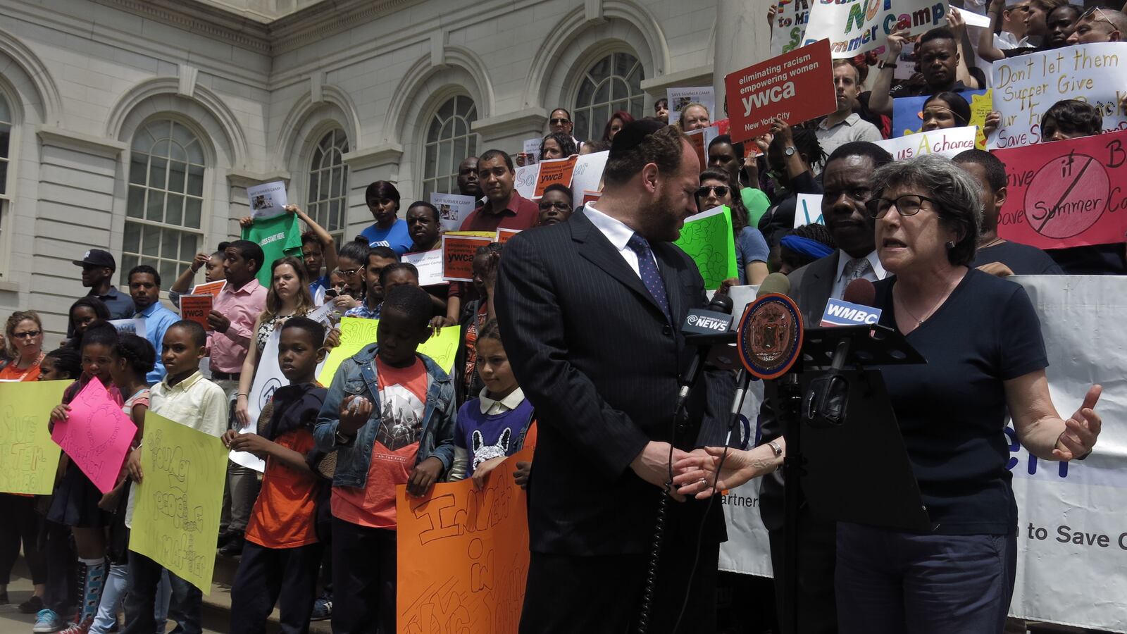 Nancy Wackstein, executive director of United Neighborhood Houses of New York, at a rally outside City Hall on Thursday as budget hearings continued inside.