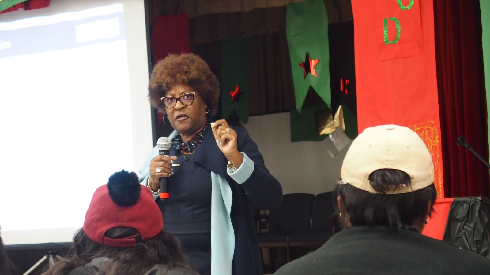 Sonya Smith, a longtime community organizer in Memphis Frayser, speaks to parents at Hawkins Mill Elementary School on Thursday during a community meeting about state intervention plans.