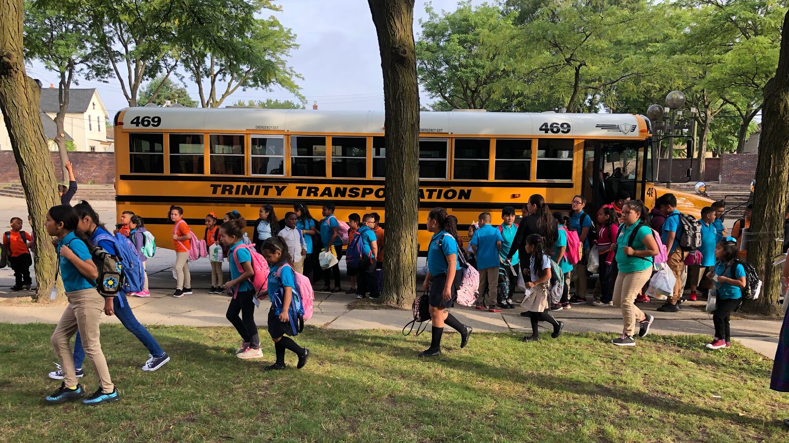 Students arrive at Escuela Avancemos, a Detroit charter school, on the first day of school in 2019.
