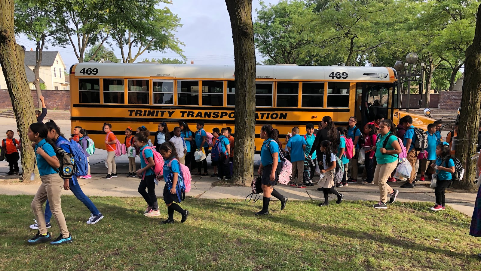 Students arrive at Escuela Avancemos, a Detroit charter school, on the first day of school in 2019.