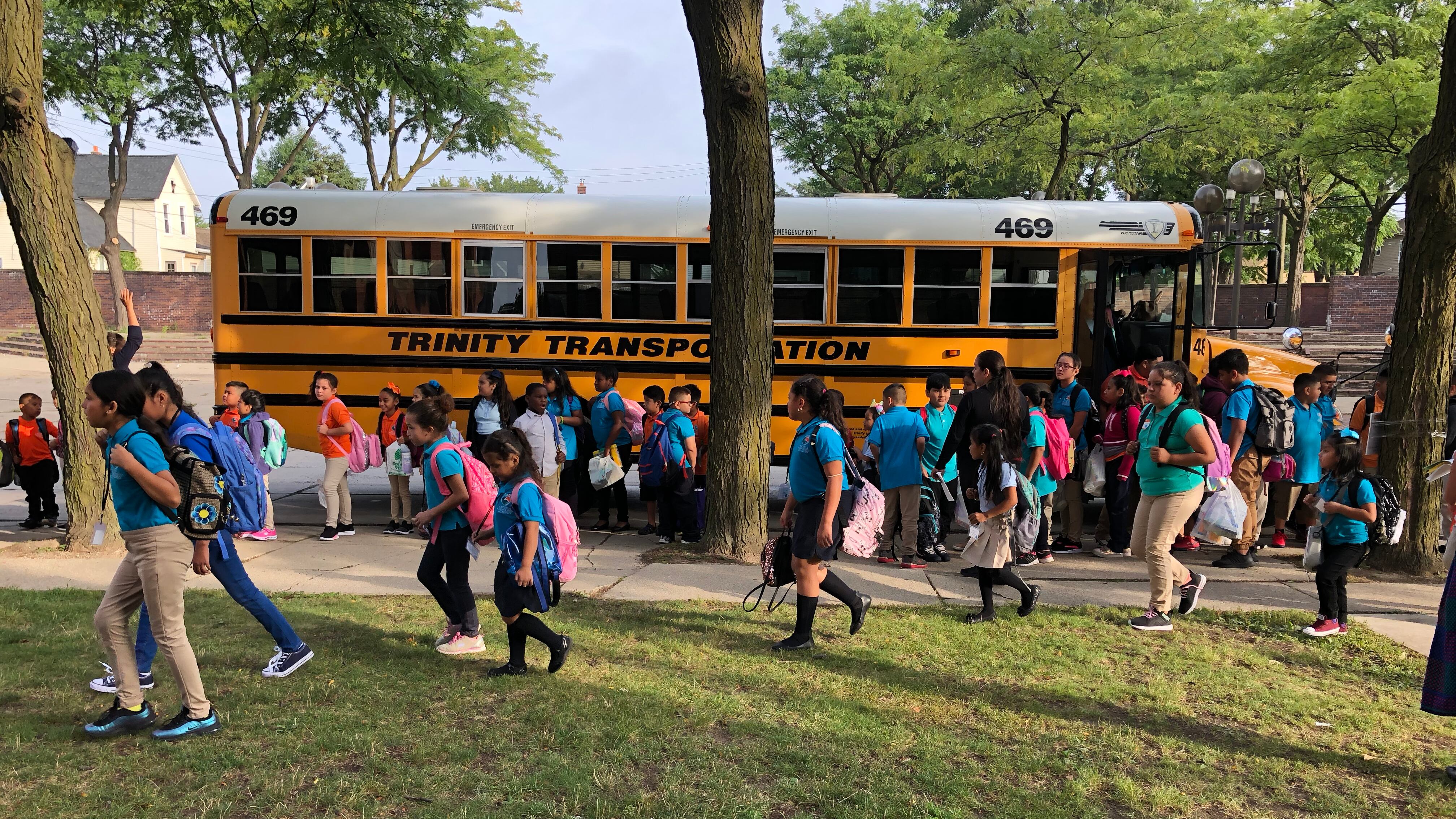 Students arrive at Escuela Avancemos, a Detroit charter school, on the first day of school in 2019.