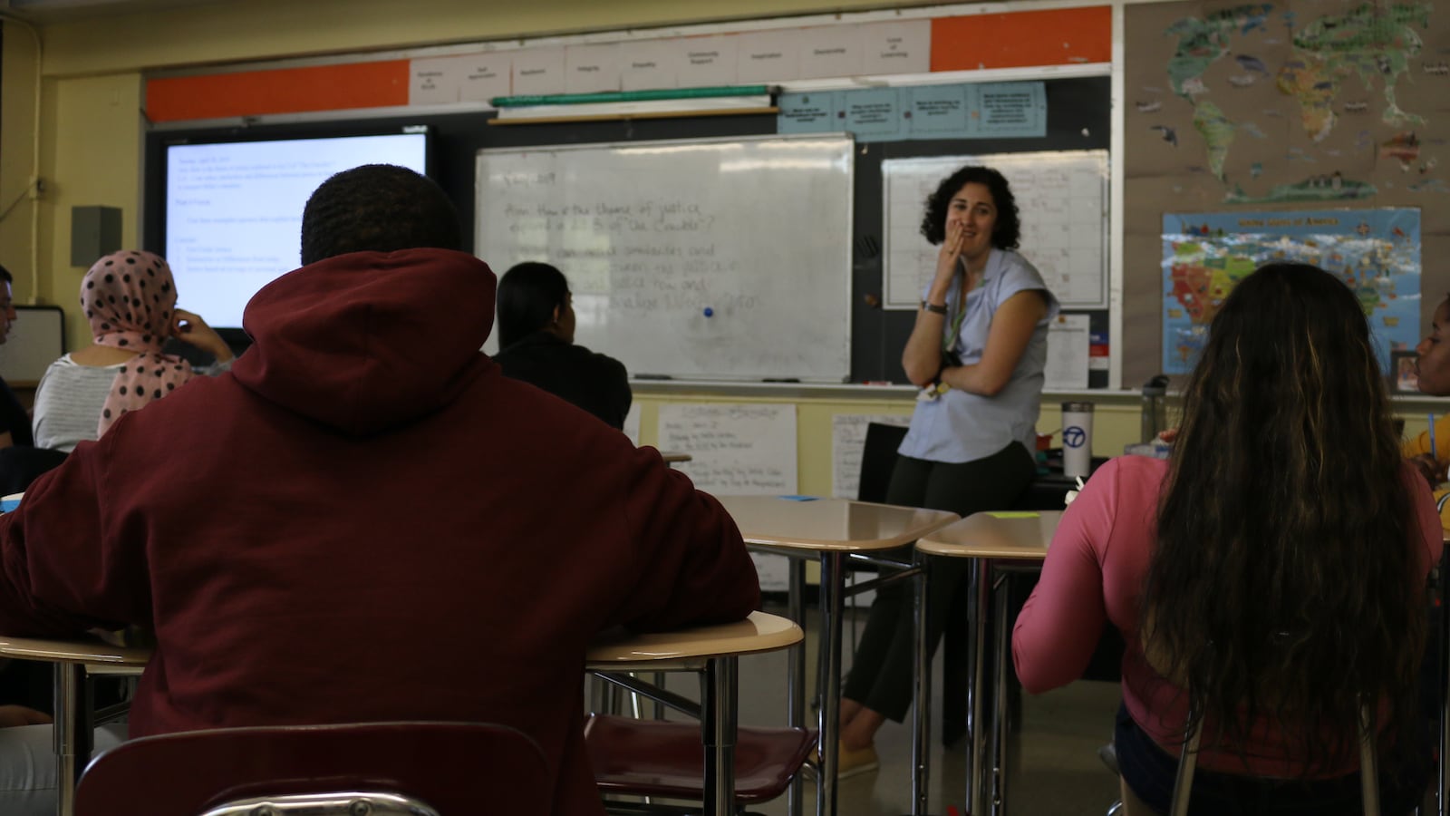 An English teacher chats about "The Crucible" with her class at ELLIS Prep Academy in the Bronx, a transfer school that serves immigrant students.