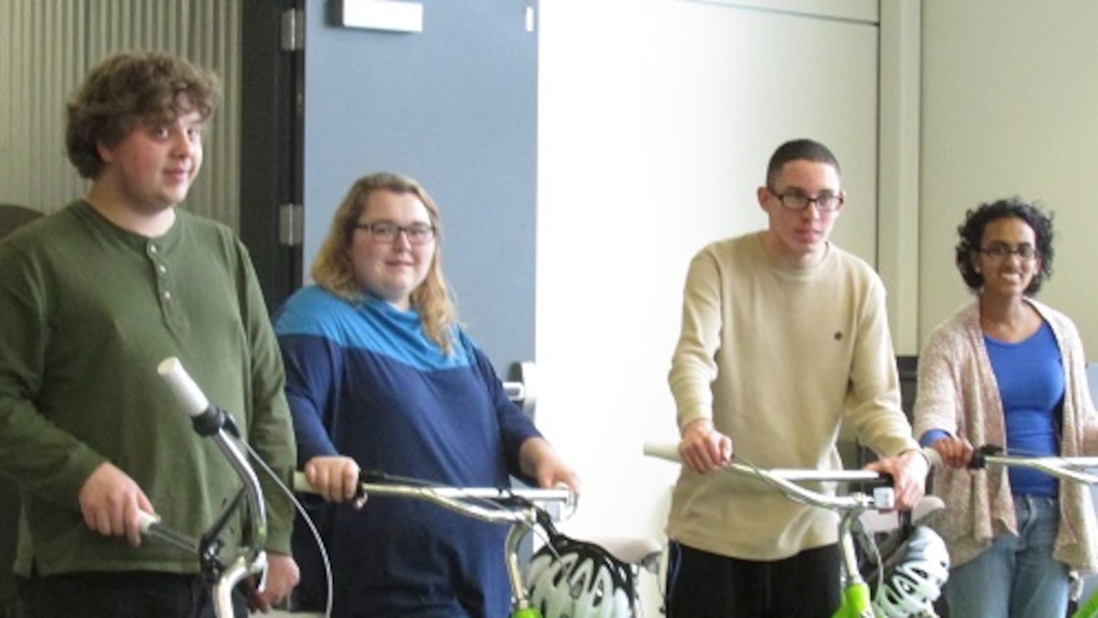 Students in the "Transitions In Englewood Schools Program" with new bikes at a ribbon-cuttin g ceremony on March 7, 2014.