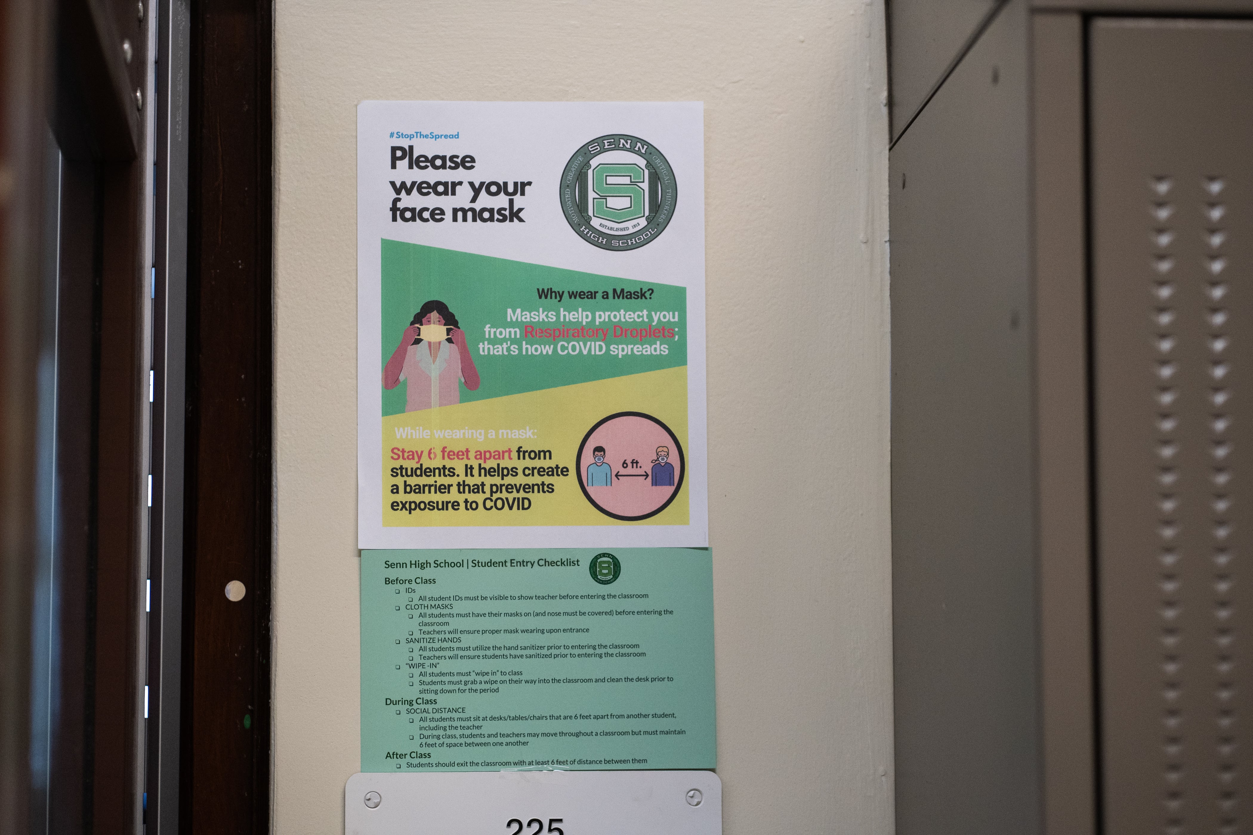 COVID-19 safety guidelines are seen in the hallways of Senn High School on April 23, 2021.