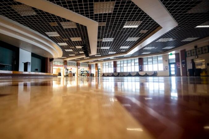 An empty high school foyer.