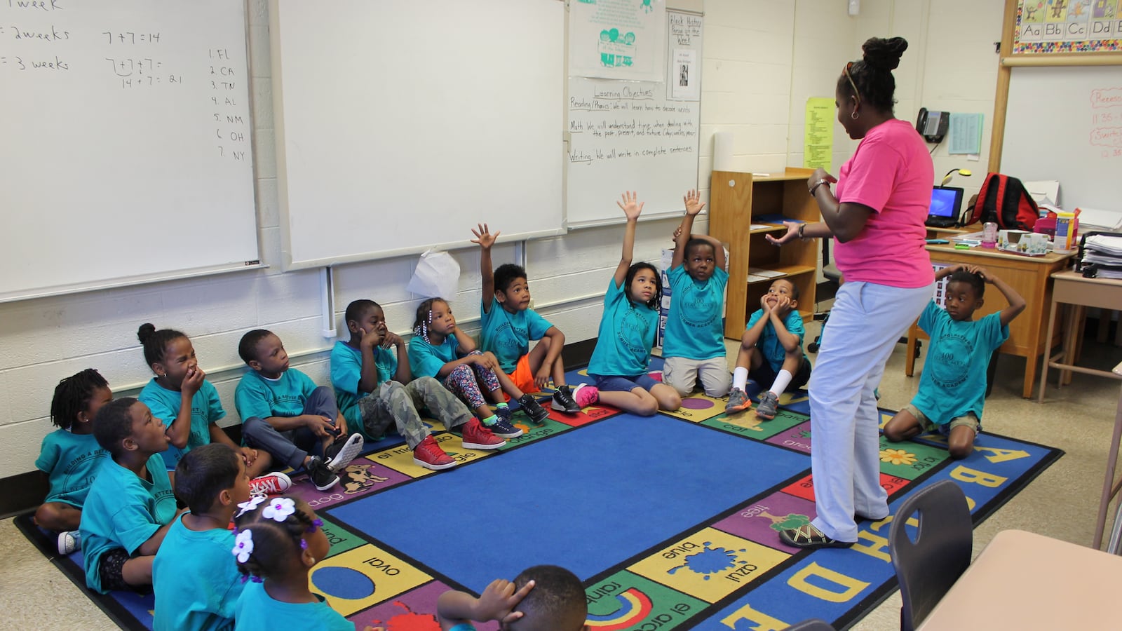 Kindergarten students participate in activities at the 100 Black Men Summer Academy at IPS School 74.