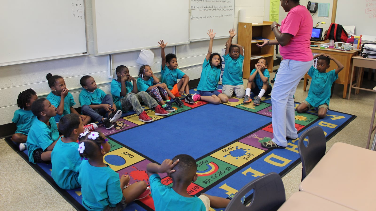 Kindergarten students participate in activities at the 100 Black Men Summer Academy at IPS School 74.