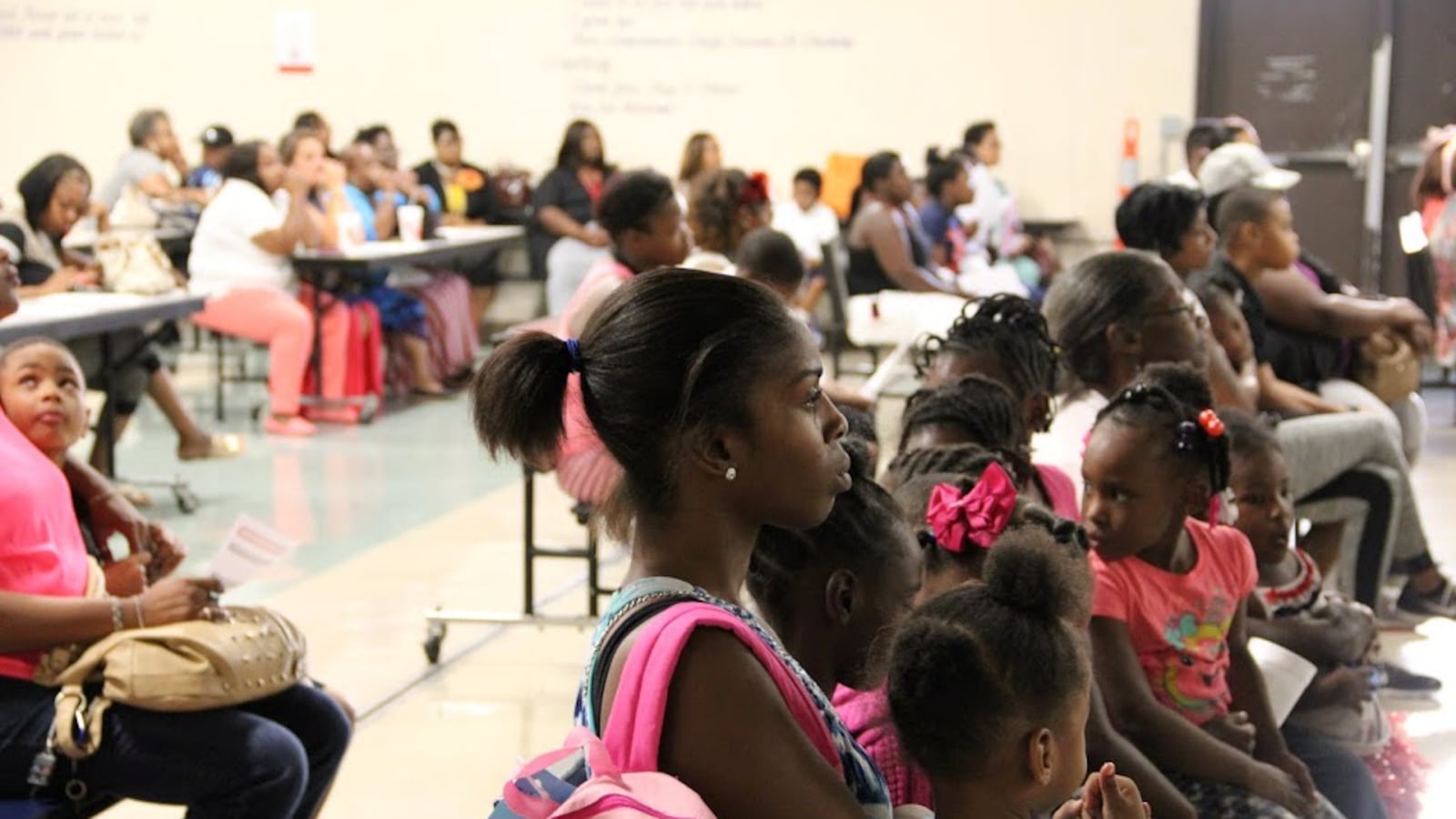 Parents at Caldwell-Guthrie Elementary School listen to a presentation by Shelby School leaders on Aug. 20 about the Memphis school's status as a state priority school. On Thursday, state officials named Caldwell-Guthrie one of six schools that may taken from local district control and converted to a charter school.
