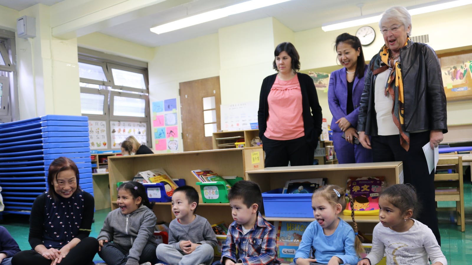 Schools Chancellor Carmen Fariña, back right, visits a Mandarin pre-K dual language program at P.S. 20 Anna Silver on the Lower East Side.