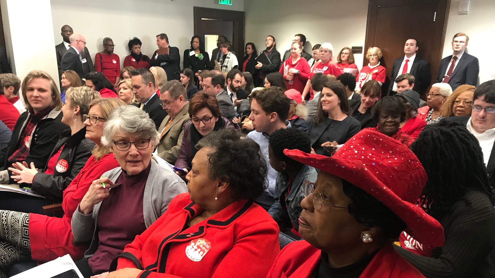 Educators wearing red pack the committee room where lawmakers considered legislation Tuesday that would create an education savings account program in Tennessee.