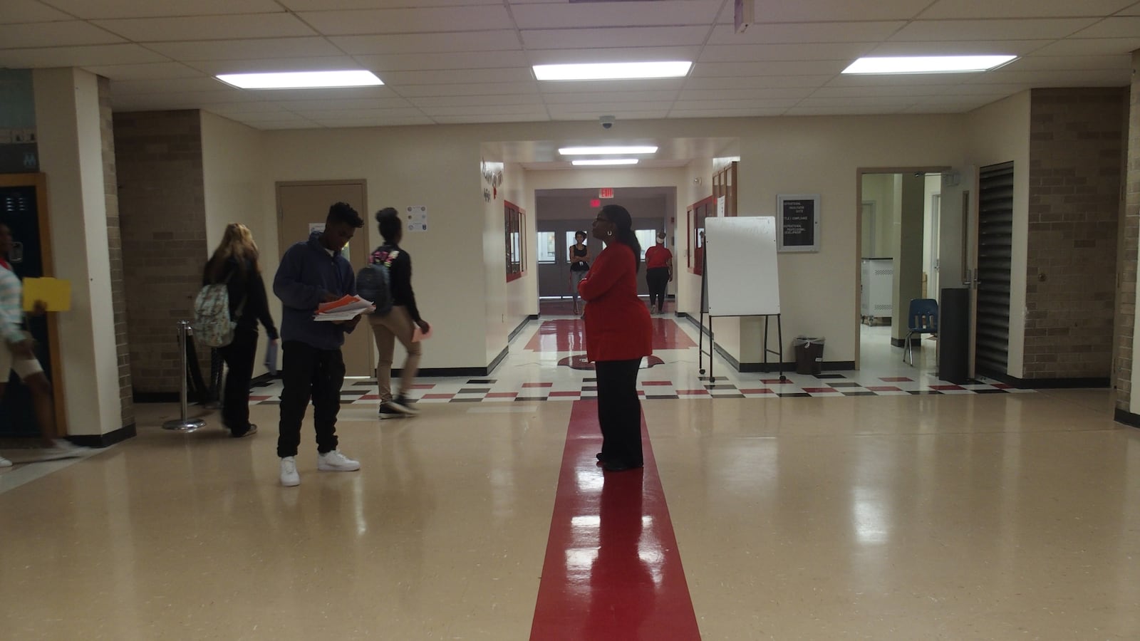 A red line on a hallway floor is designed to separate middle school students from those in upper grades at the newly reconfigured Raleigh-Egypt High School.