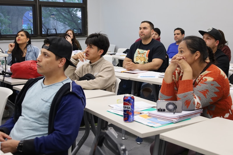 A classroom full of students.