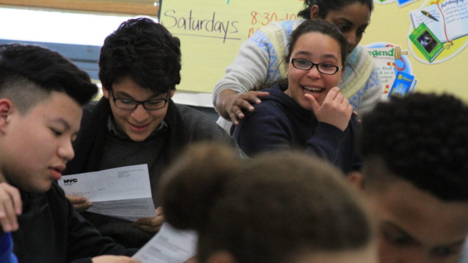 Eighth-grade students at M.S. 244 in the Bronx receive their high school admission letters in 2016.