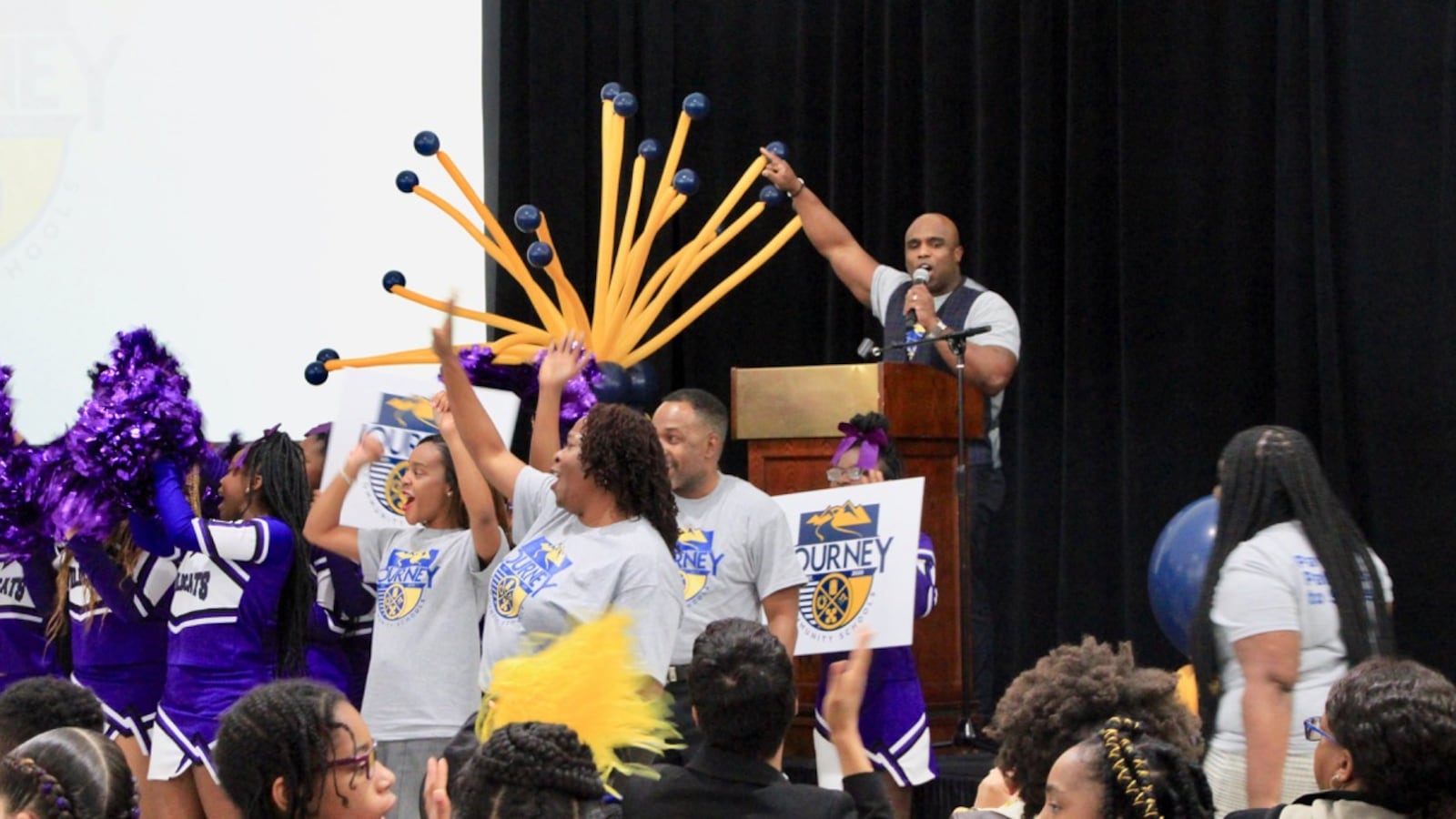 Aspire leader Nickalous Manning asked the group of students and community leaders, “Are you ready to find out who we are?" He will remain in leadership as the charter network transitions.